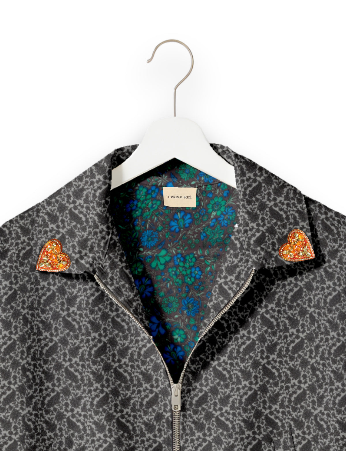 Love Bomber Jacket made from recycled fabric, featuring hand-stitched Aari embroidery. A unique piece of zero-waste clothing, part of the circular fashion movement. Designed with upcycled materials for a stylish yet environmentally friendly clothing choice.
