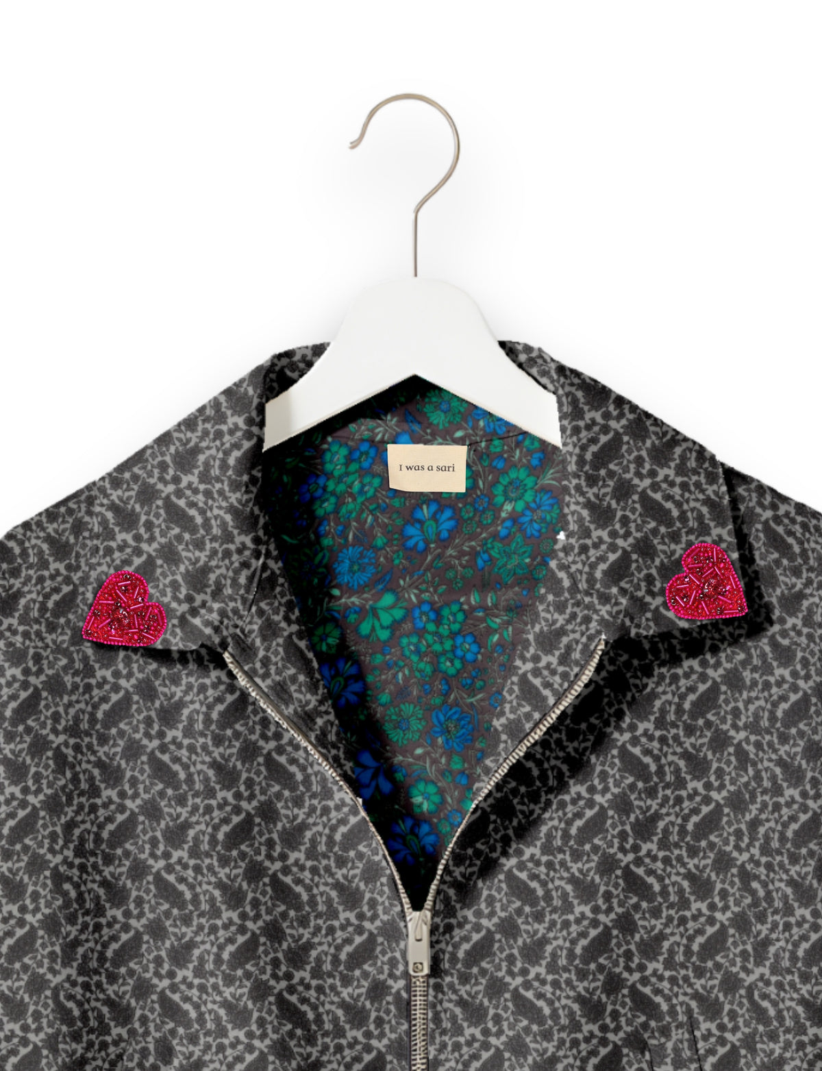 Love Bomber Jacket made from recycled fabric, featuring hand-stitched Aari embroidery. A unique piece of zero-waste clothing, part of the circular fashion movement. Designed with upcycled materials for a stylish yet environmentally friendly clothing choice.