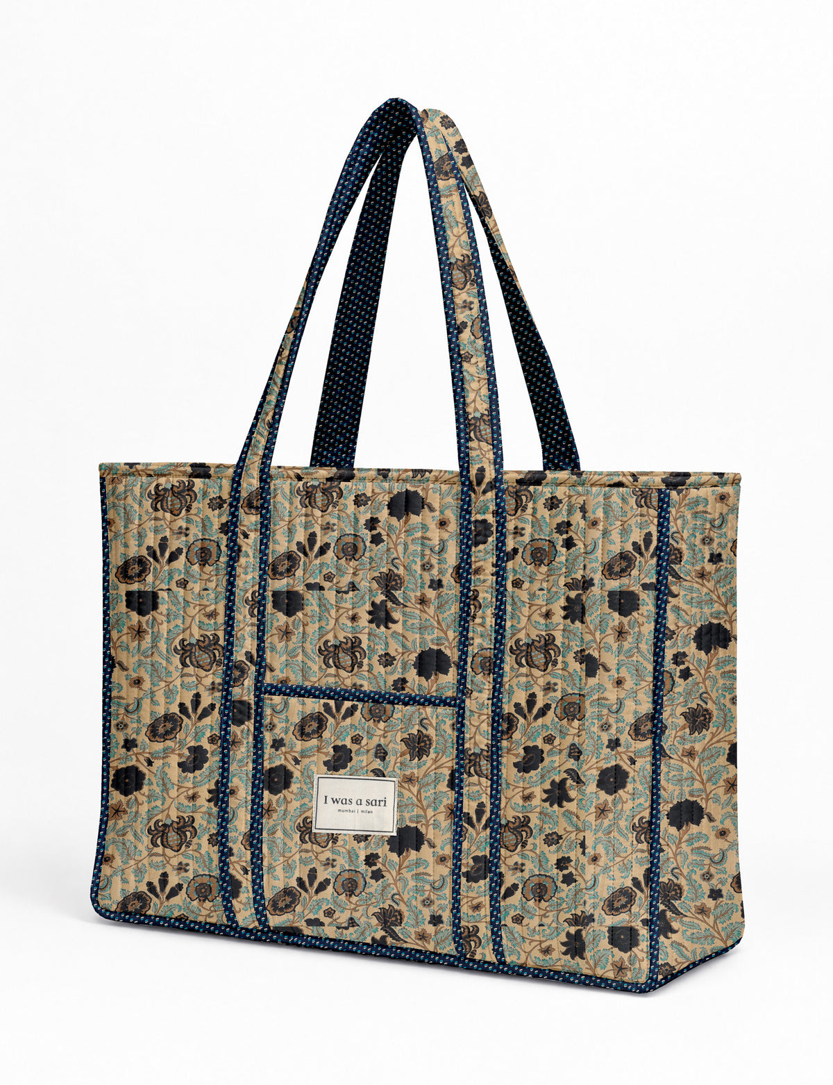 Quilted work tote bag with structured rectangular design and long shoulder straps, representing slow fashion and ethical clothing ideals, made as part of upcycled women's clothing and sustainable women's clothing using recycled fashion and earth friendly clothing practices.