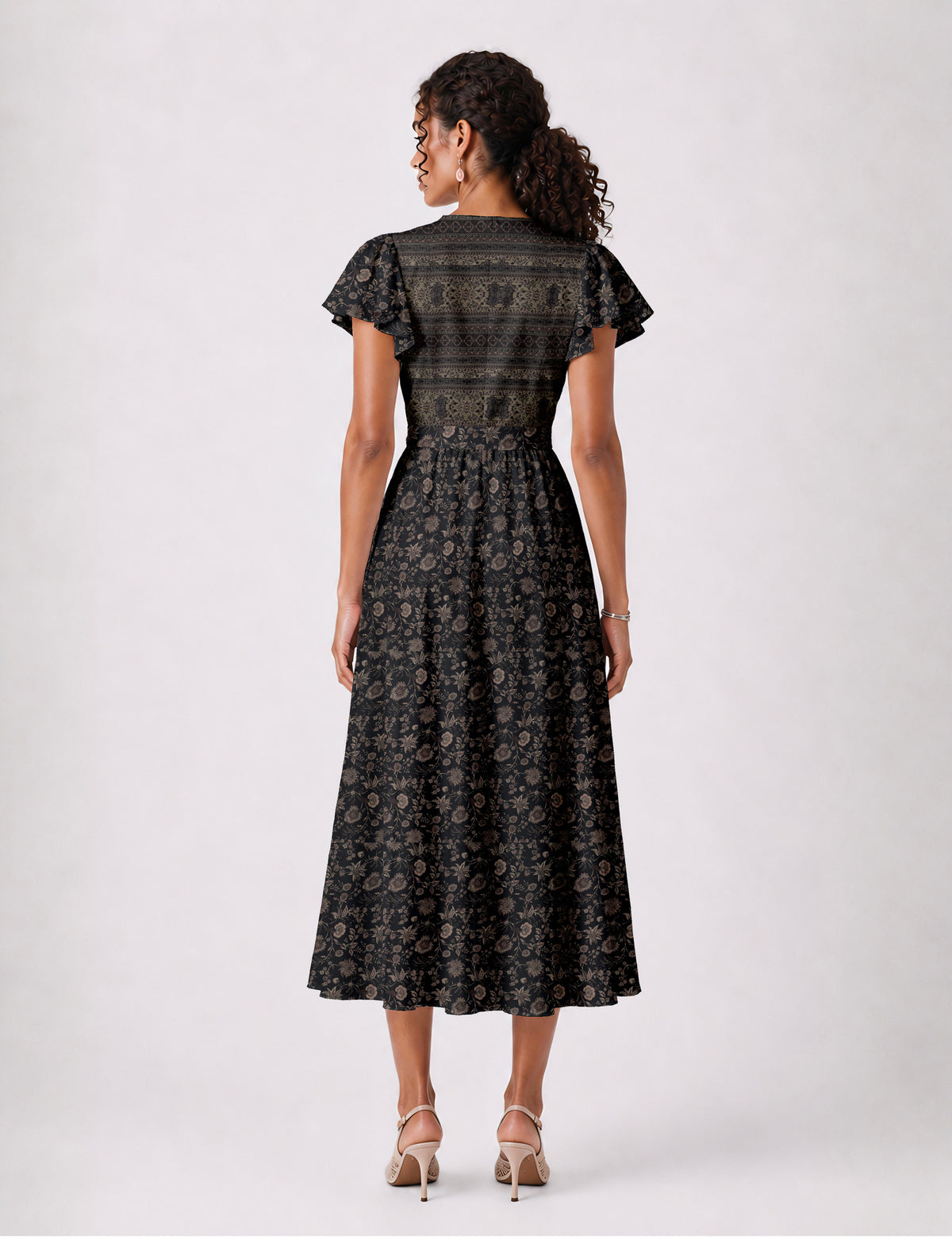Elegant midi wrap dress with a V-neckline, adjustable waist tie, fitted bodice, and flared skirt for a timeless, flattering silhouette.