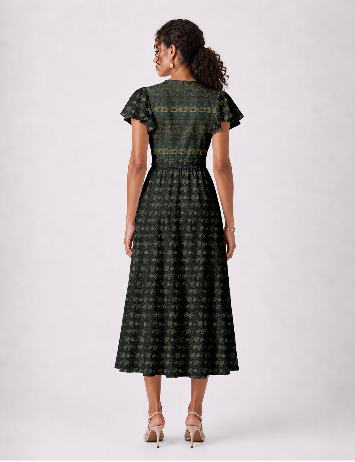 Elegant midi wrap dress with a V-neckline, adjustable waist tie, fitted bodice, and flared skirt for a timeless, flattering silhouette.