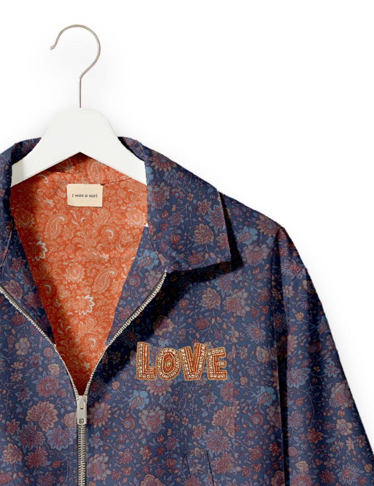 Love Bomber Jacket made from recycled fabric, featuring hand-stitched Aari embroidery. A unique piece of zero-waste clothing, part of the circular fashion movement. Designed with upcycled materials for a stylish yet environmentally friendly clothing choice.