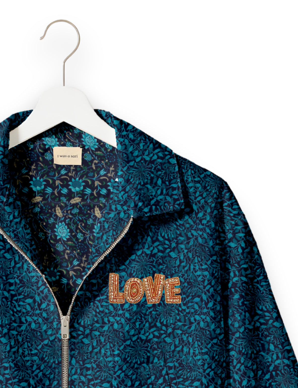 Love Bomber Jacket made from recycled fabric, featuring hand-stitched Aari embroidery. A unique piece of zero-waste clothing, part of the circular fashion movement. Designed with upcycled materials for a stylish yet environmentally friendly clothing choice.