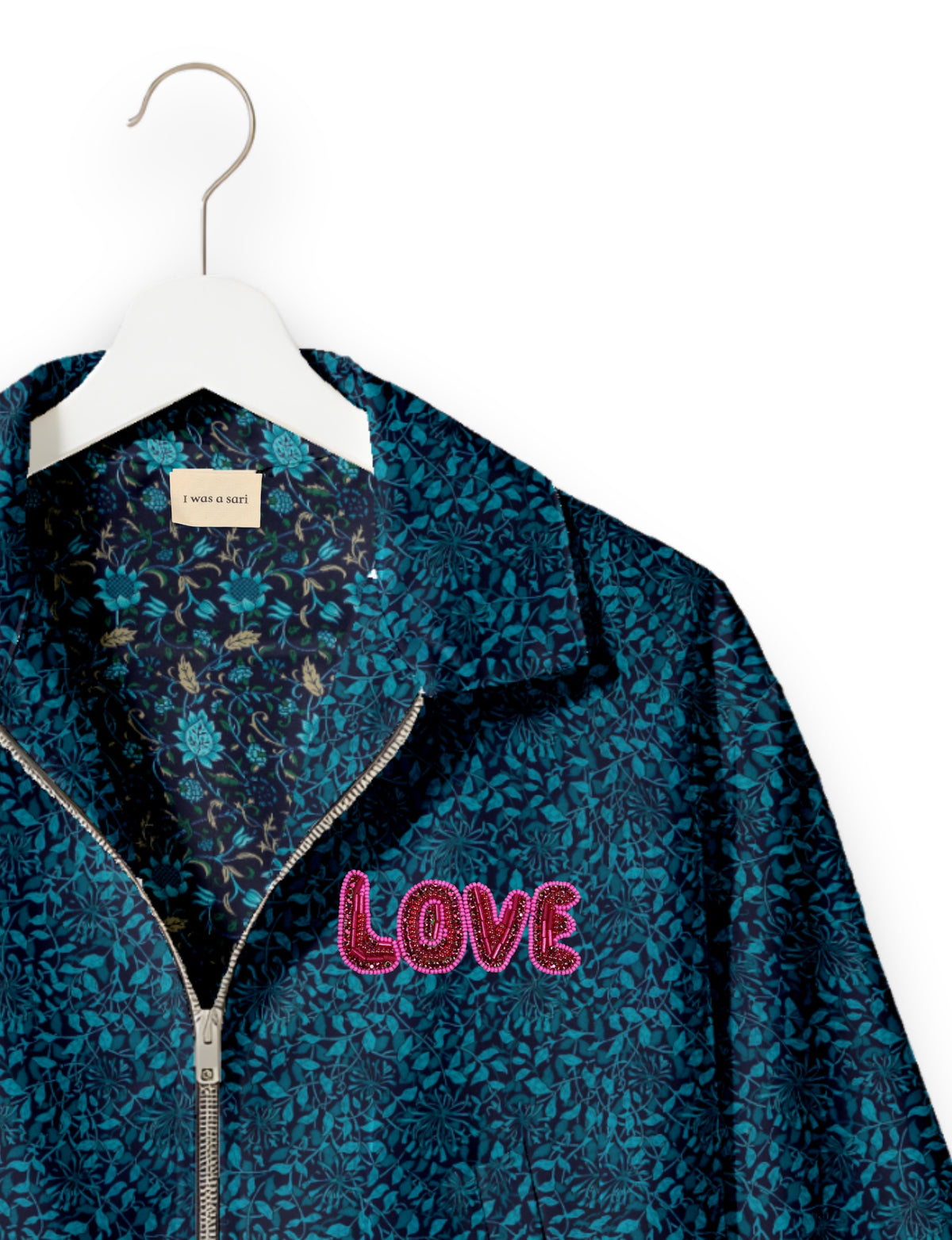Love Bomber Jacket made from recycled fabric, featuring hand-stitched Aari embroidery. A unique piece of zero-waste clothing, part of the circular fashion movement. Designed with upcycled materials for a stylish yet environmentally friendly clothing choice.