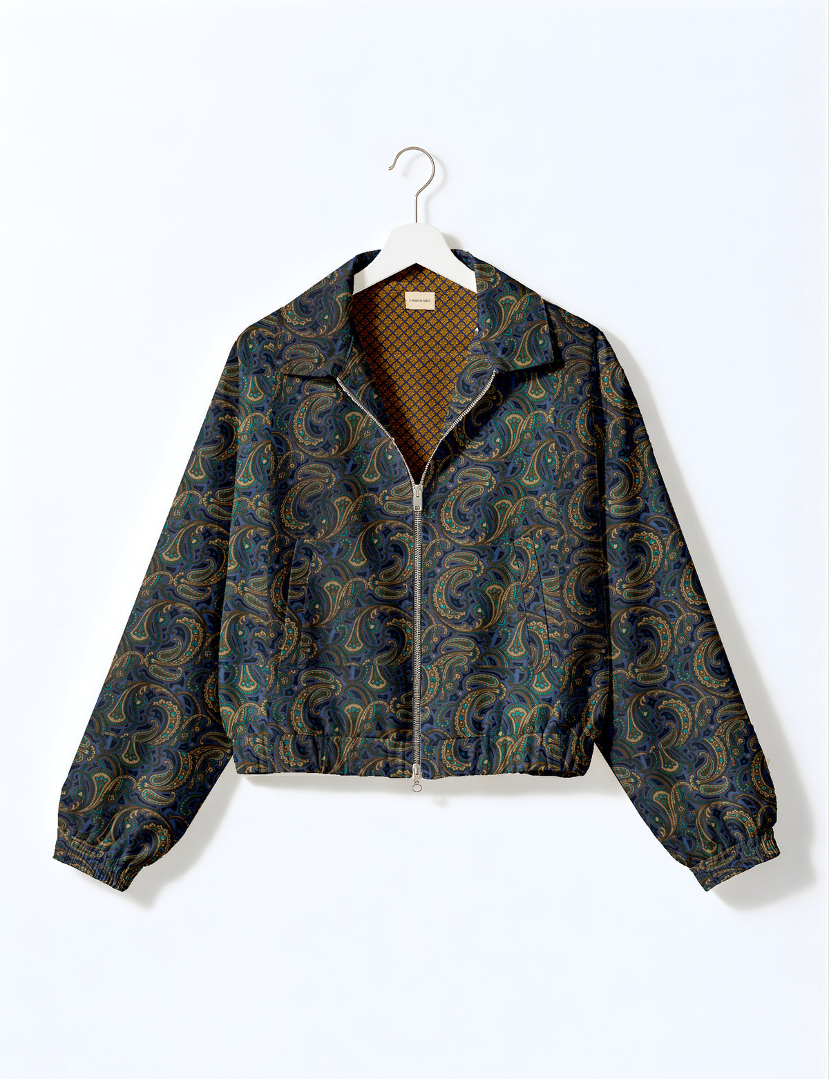Woman wearing a yellow floral bomber jacket with front zipper, elastic cuffs, and side pockets, shown from front view