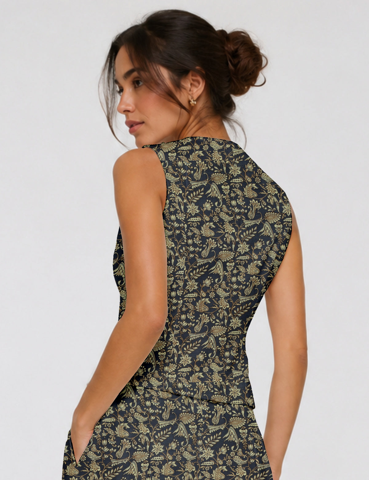 Women's fitted waistcoat with V-neck, single-breasted button closure, tailored silhouette, and pointed hem in sustainable fashion.
