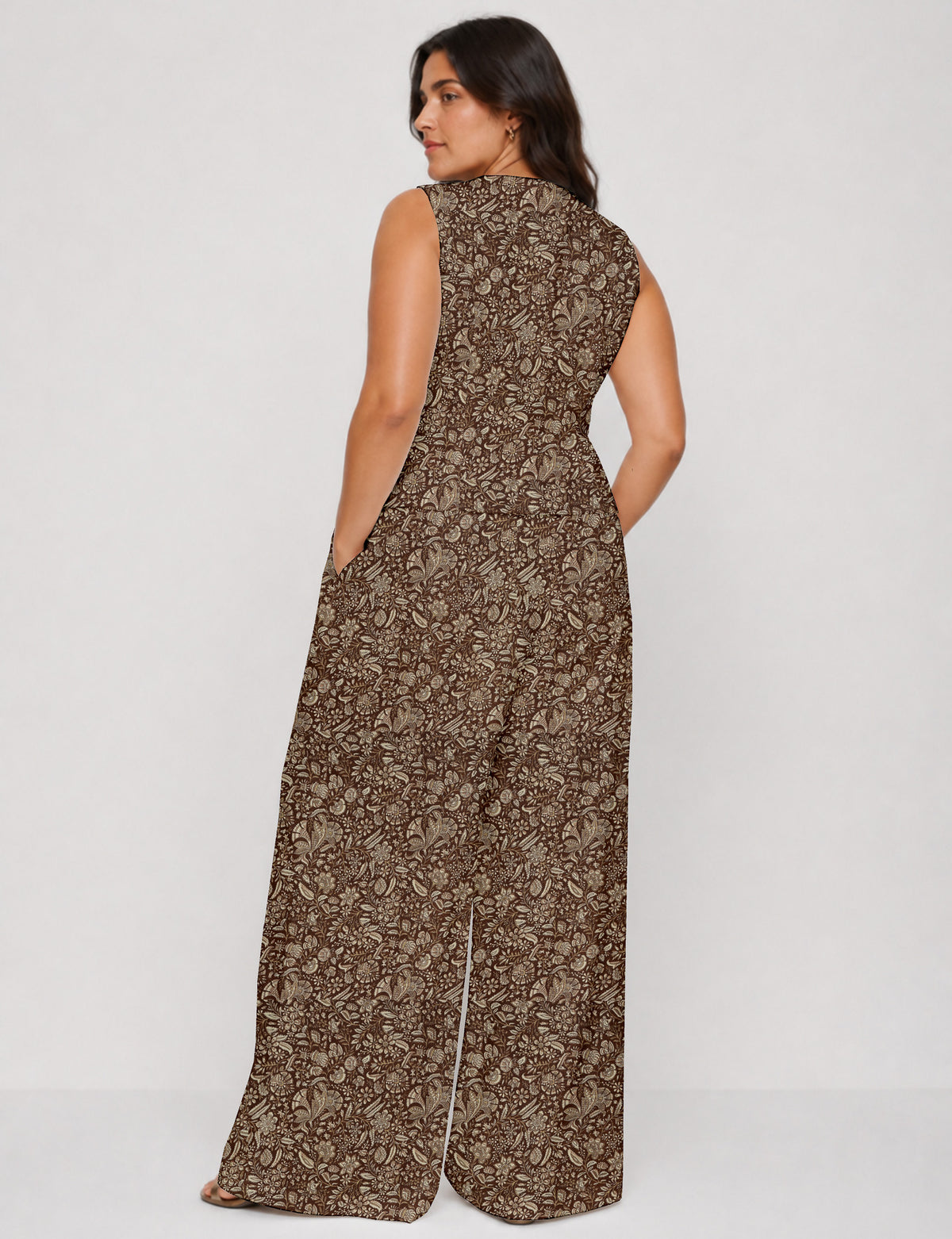 Women's tailored waistcoat set with a sleeveless V-neck button-front waistcoat and high-rise wide leg trousers in a coordinated matching outfit.