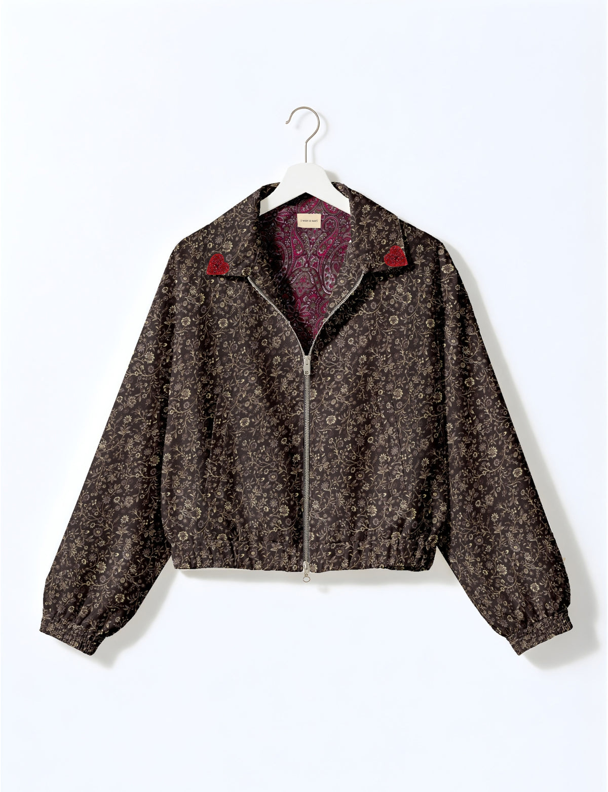 Love Bomber Jacket made from recycled fabric, featuring hand-stitched Aari embroidery. A unique piece of zero-waste clothing, part of the circular fashion movement. Designed with upcycled materials for a stylish yet environmentally friendly clothing choice.