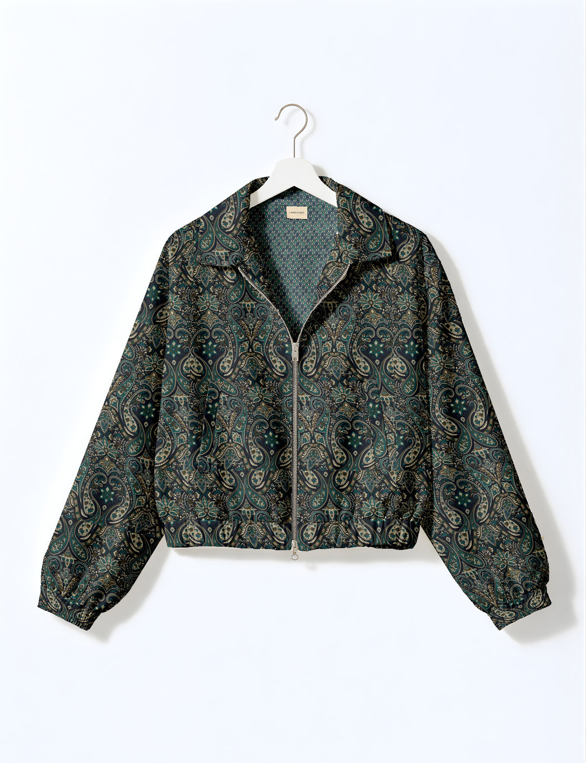 Brown floral bomber jacket with front zipper, elastic cuffs and hem, hanging on white hanger, red floral inner lining visible