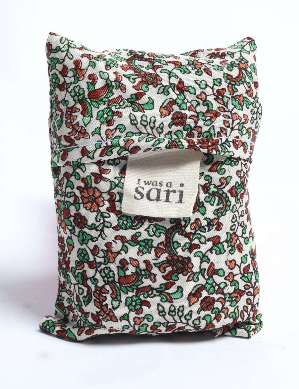Beige reusable bag with green and brown floral micro design, folded with a label reading "I was a sari" visible