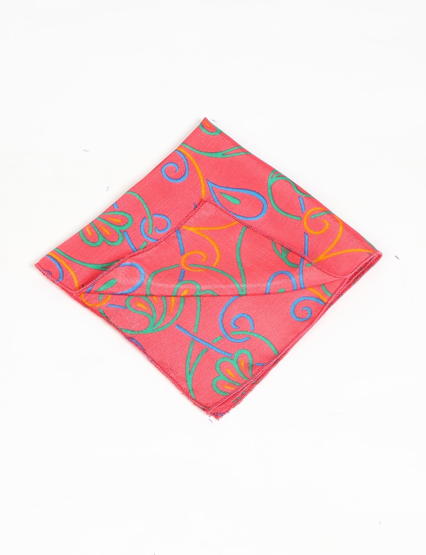 A delicately handcrafted wrap made from recycled sari offcuts, blending sustainable fashion with conscious design. This eco-friendly product showcases the beauty of upcycling and green fashion, making it a perfect accessory for those supporting circular fashion and products made from textile waste.