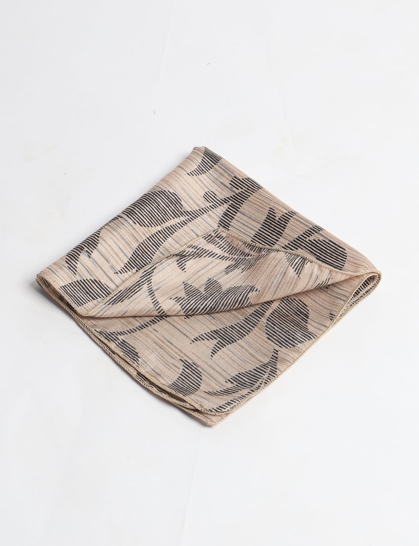 A delicately handcrafted wrap made from recycled sari offcuts, blending sustainable fashion with conscious design. This eco-friendly product showcases the beauty of upcycling and green fashion, making it a perfect accessory for those supporting circular fashion and products made from textile waste.