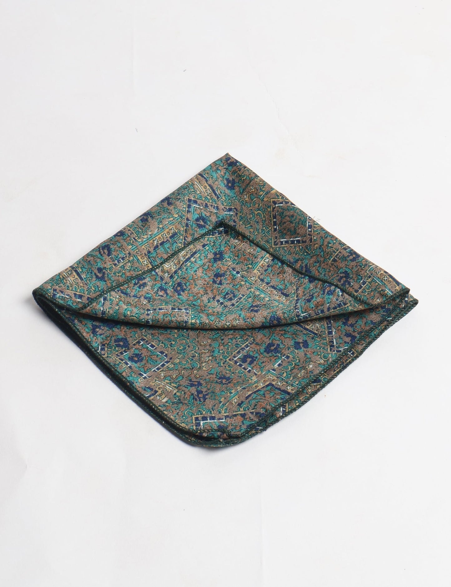 A delicately handcrafted wrap made from recycled sari offcuts, blending sustainable fashion with conscious design. This eco-friendly product showcases the beauty of upcycling and green fashion, making it a perfect accessory for those supporting circular fashion and products made from textile waste.