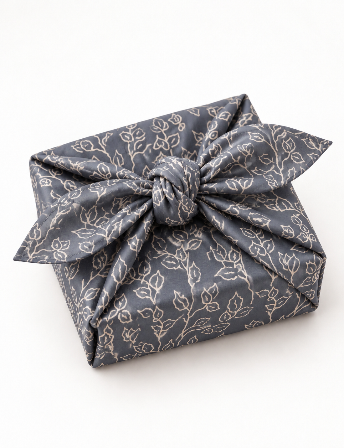 A delicately handcrafted wrap made from recycled sari offcuts, blending sustainable fashion with conscious design. This eco-friendly product showcases the beauty of upcycling and green fashion, making it a perfect accessory for those supporting circular fashion and products made from textile waste.