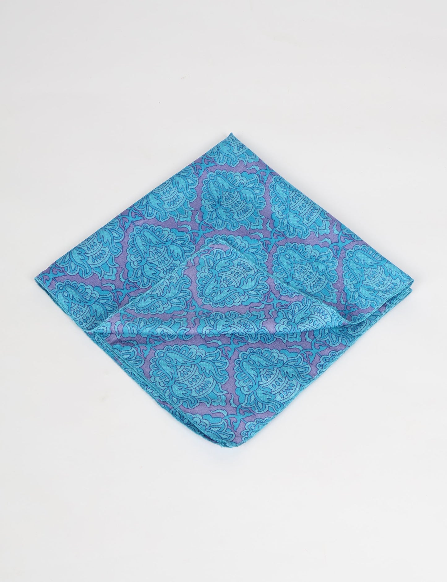 A delicately handcrafted wrap made from recycled sari offcuts, blending sustainable fashion with conscious design. This eco-friendly product showcases the beauty of upcycling and green fashion, making it a perfect accessory for those supporting circular fashion and products made from textile waste.