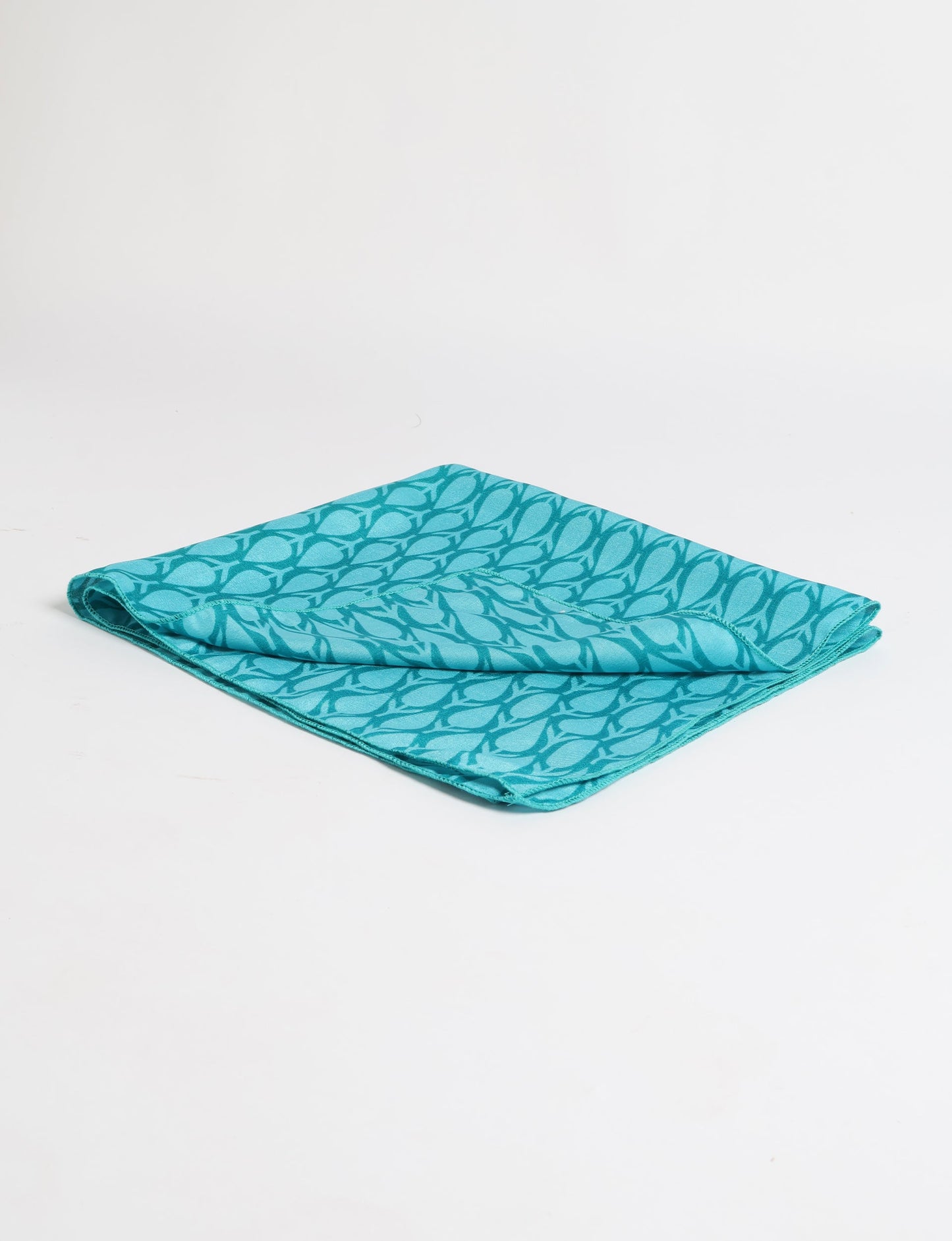 A delicately handcrafted wrap made from recycled sari offcuts, blending sustainable fashion with conscious design. This eco-friendly product showcases the beauty of upcycling and green fashion, making it a perfect accessory for those supporting circular fashion and products made from textile waste.