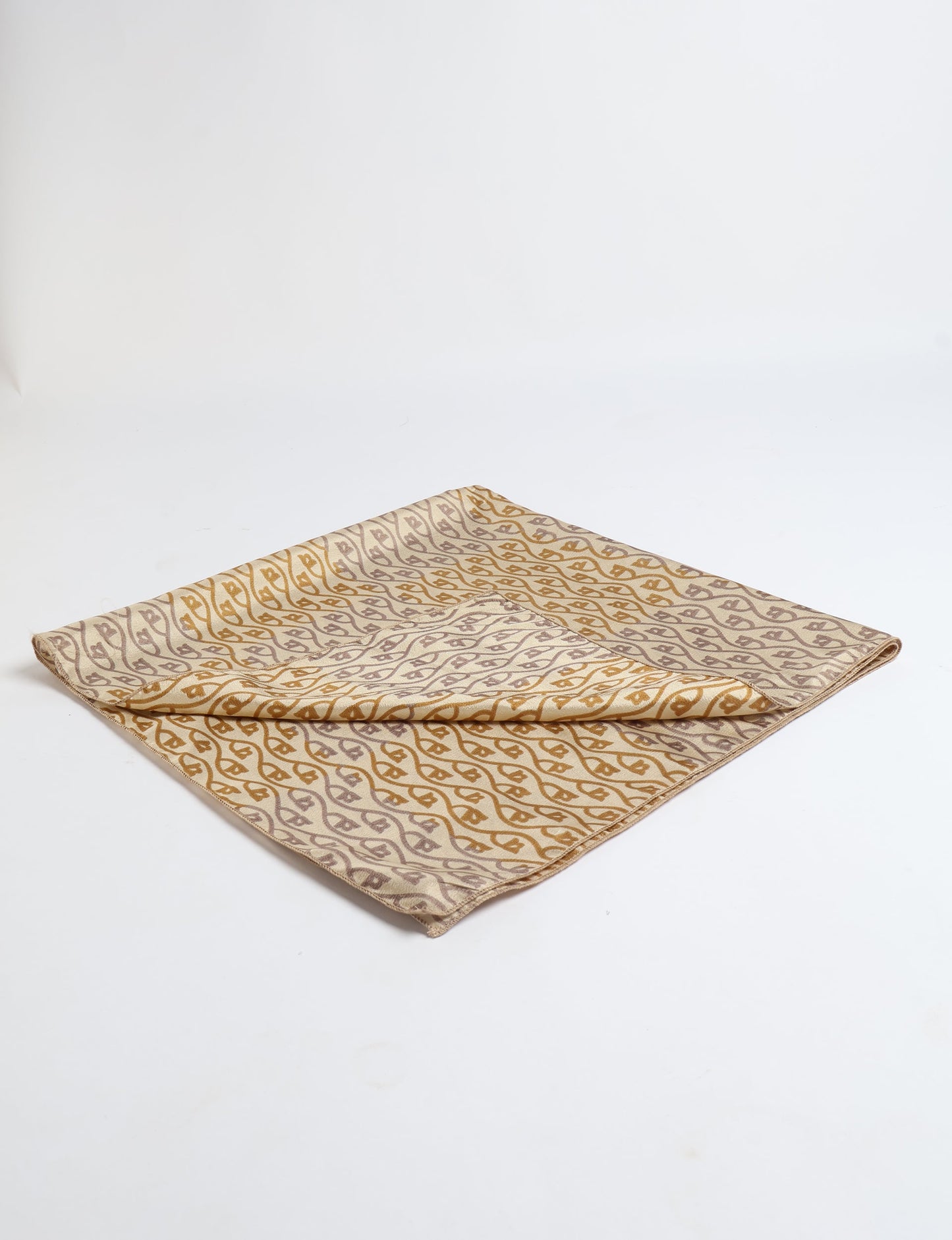 A delicately handcrafted wrap made from recycled sari offcuts, blending sustainable fashion with conscious design. This eco-friendly product showcases the beauty of upcycling and green fashion, making it a perfect accessory for those supporting circular fashion and products made from textile waste.