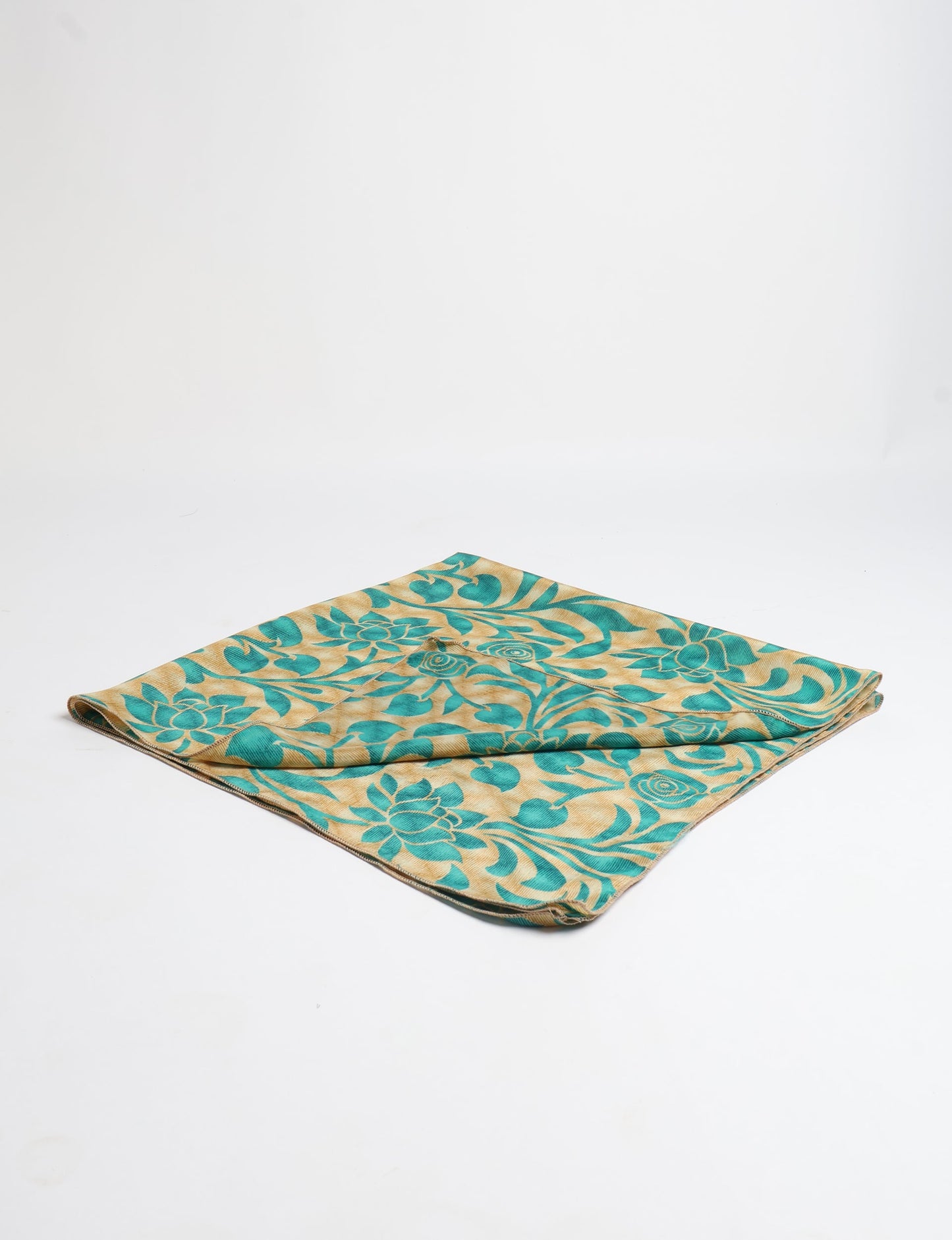 A delicately handcrafted wrap made from recycled sari offcuts, blending sustainable fashion with conscious design. This eco-friendly product showcases the beauty of upcycling and green fashion, making it a perfect accessory for those supporting circular fashion and products made from textile waste.