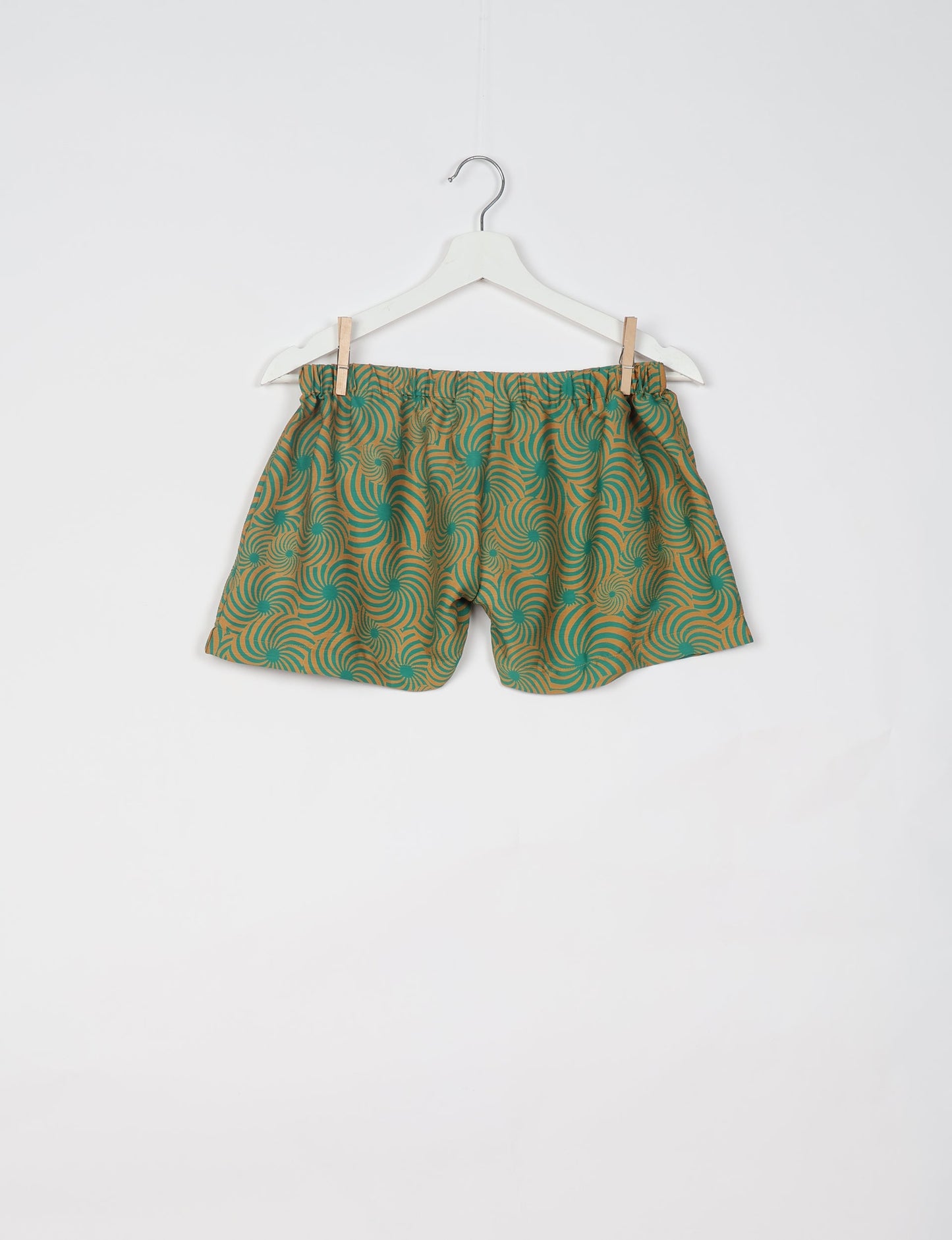 Elevate your wardrobe with our eco-friendly shorts. The all-around elastic waist and drawstring tie provide comfort and style. Crafted with ethical and sustainable practices, these shorts redefine green fashion, making them a perfect addition to your conscious clothing collection.