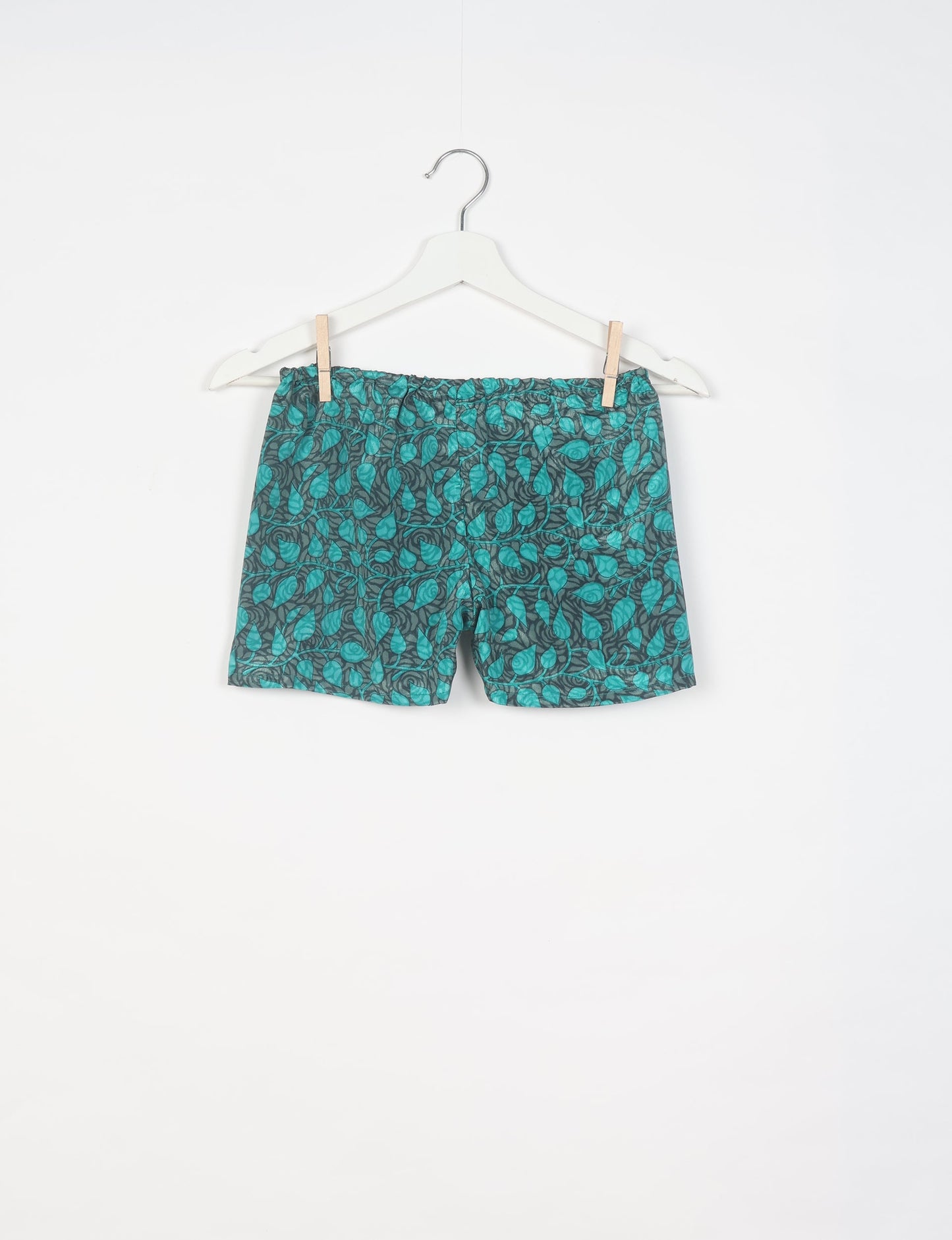 Elevate your wardrobe with our eco-friendly shorts. The all-around elastic waist and drawstring tie provide comfort and style. Crafted with ethical and sustainable practices, these shorts redefine green fashion, making them a perfect addition to your conscious clothing collection.