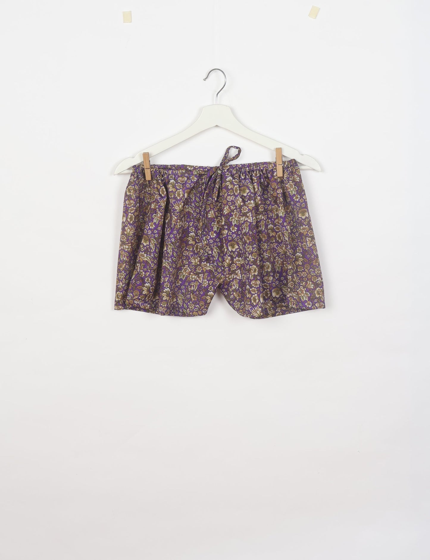 Sleep in eco-friendly luxury with our PJ Set Short. Made for the conscious consumer, these pajamas contribute to zero waste and sustainable practices. The cami top, adorned with delicate eyelash lace and cut on the bias, pairs seamlessly with the comfy shorts featuring an elasticated waist and drawstring tie.