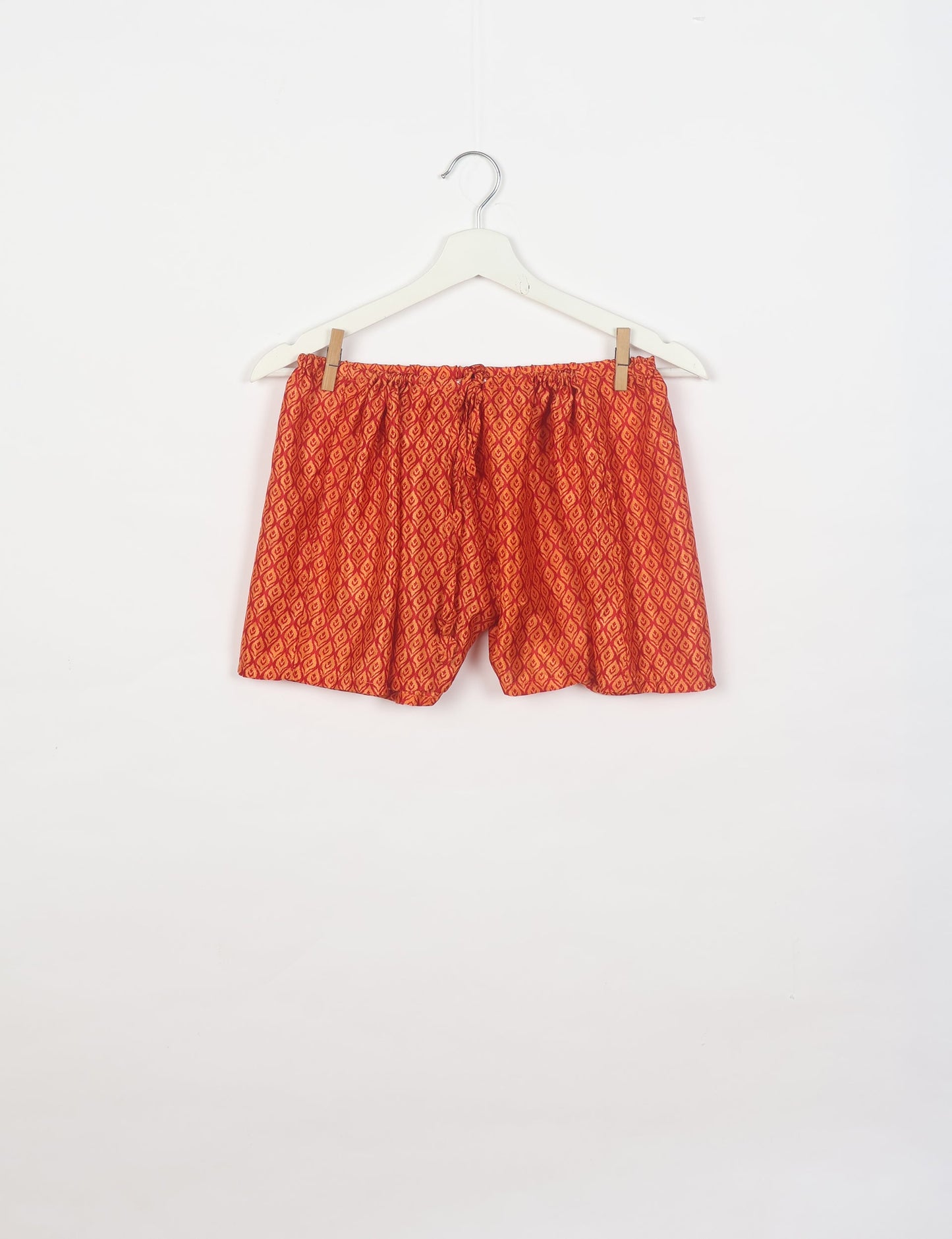Sleep in eco-friendly luxury with our PJ Set Short. Made for the conscious consumer, these pajamas contribute to zero waste and sustainable practices. The cami top, adorned with delicate eyelash lace and cut on the bias, pairs seamlessly with the comfy shorts featuring an elasticated waist and drawstring tie.