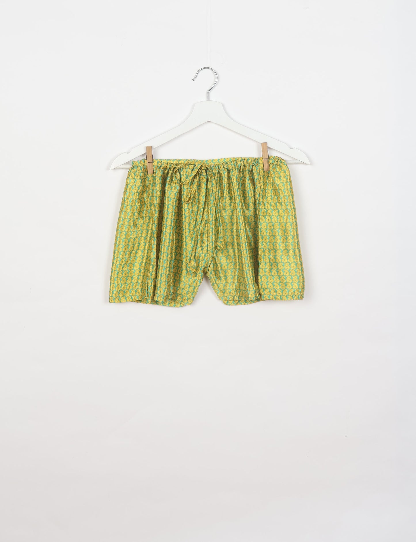 Sleep in eco-friendly luxury with our PJ Set Short. Made for the conscious consumer, these pajamas contribute to zero waste and sustainable practices. The cami top, adorned with delicate eyelash lace and cut on the bias, pairs seamlessly with the comfy shorts featuring an elasticated waist and drawstring tie.