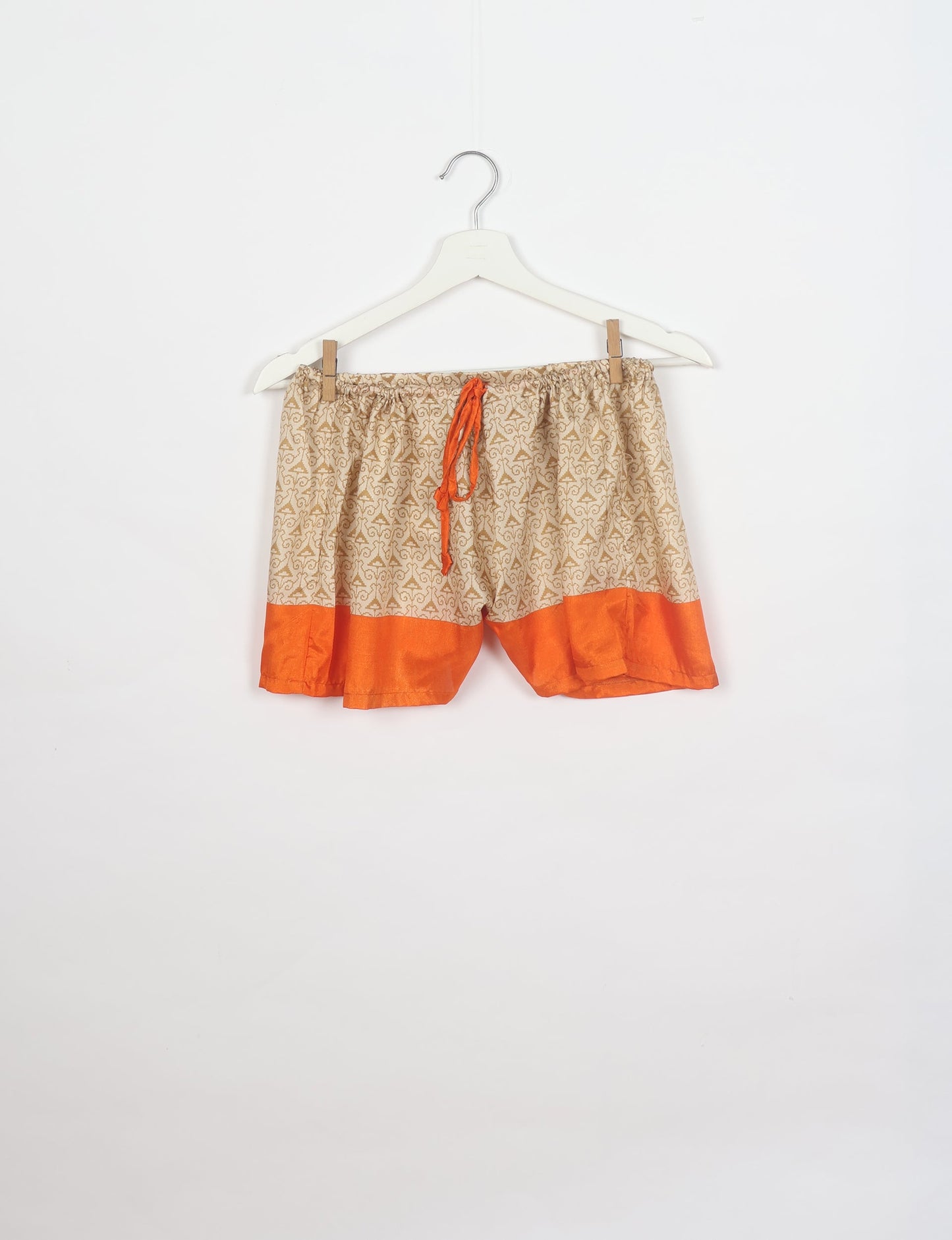 Sleep in eco-friendly luxury with our PJ Set Short. Made for the conscious consumer, these pajamas contribute to zero waste and sustainable practices. The cami top, adorned with delicate eyelash lace and cut on the bias, pairs seamlessly with the comfy shorts featuring an elasticated waist and drawstring tie.