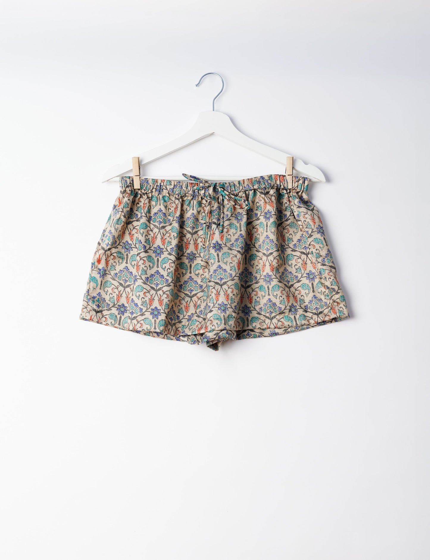 Sleep in eco-friendly luxury with our PJ Set Short. Made for the conscious consumer, these pajamas contribute to zero waste and sustainable practices. The cami top, adorned with delicate eyelash lace and cut on the bias, pairs seamlessly with the comfy shorts featuring an elasticated waist and drawstring tie.