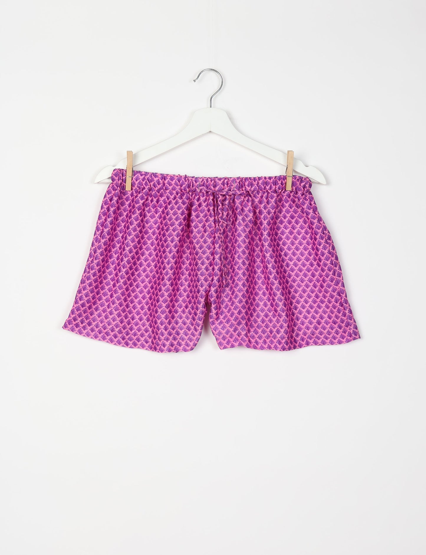 Sleep in eco-friendly luxury with our PJ Set Short. Made for the conscious consumer, these pajamas contribute to zero waste and sustainable practices. The cami top, adorned with delicate eyelash lace and cut on the bias, pairs seamlessly with the comfy shorts featuring an elasticated waist and drawstring tie.