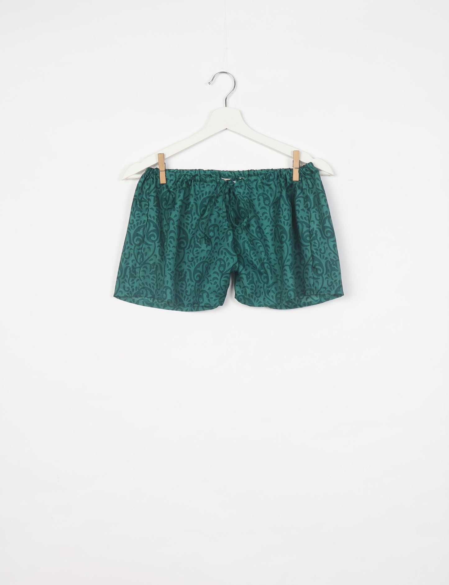 Sleep in eco-friendly luxury with our PJ Set Short. Made for the conscious consumer, these pajamas contribute to zero waste and sustainable practices. The cami top, adorned with delicate eyelash lace and cut on the bias, pairs seamlessly with the comfy shorts featuring an elasticated waist and drawstring tie.