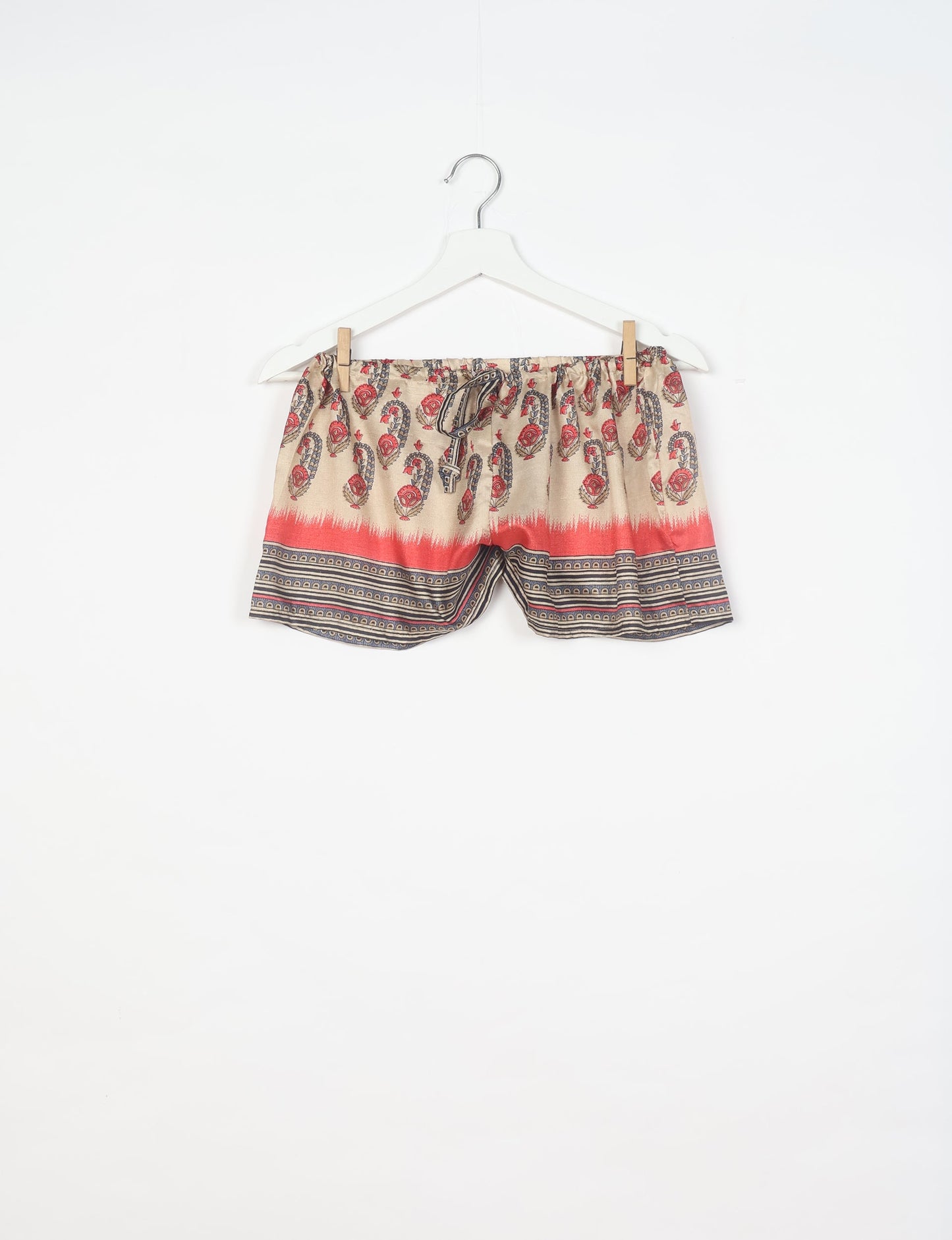 Sleep in eco-friendly luxury with our PJ Set Short. Made for the conscious consumer, these pajamas contribute to zero waste and sustainable practices. The cami top, adorned with delicate eyelash lace and cut on the bias, pairs seamlessly with the comfy shorts featuring an elasticated waist and drawstring tie.