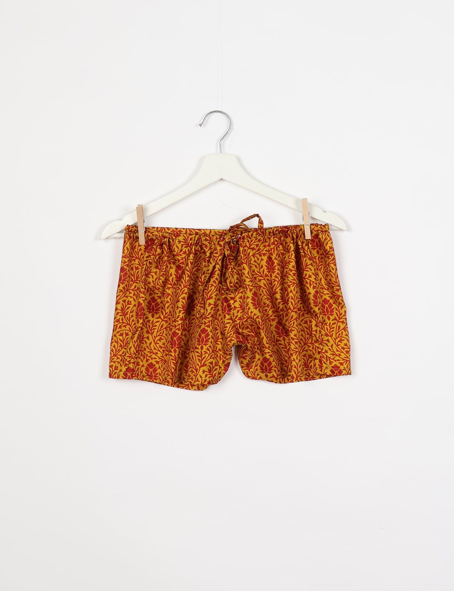 Sleep in eco-friendly luxury with our PJ Set Short. Made for the conscious consumer, these pajamas contribute to zero waste and sustainable practices. The cami top, adorned with delicate eyelash lace and cut on the bias, pairs seamlessly with the comfy shorts featuring an elasticated waist and drawstring tie.