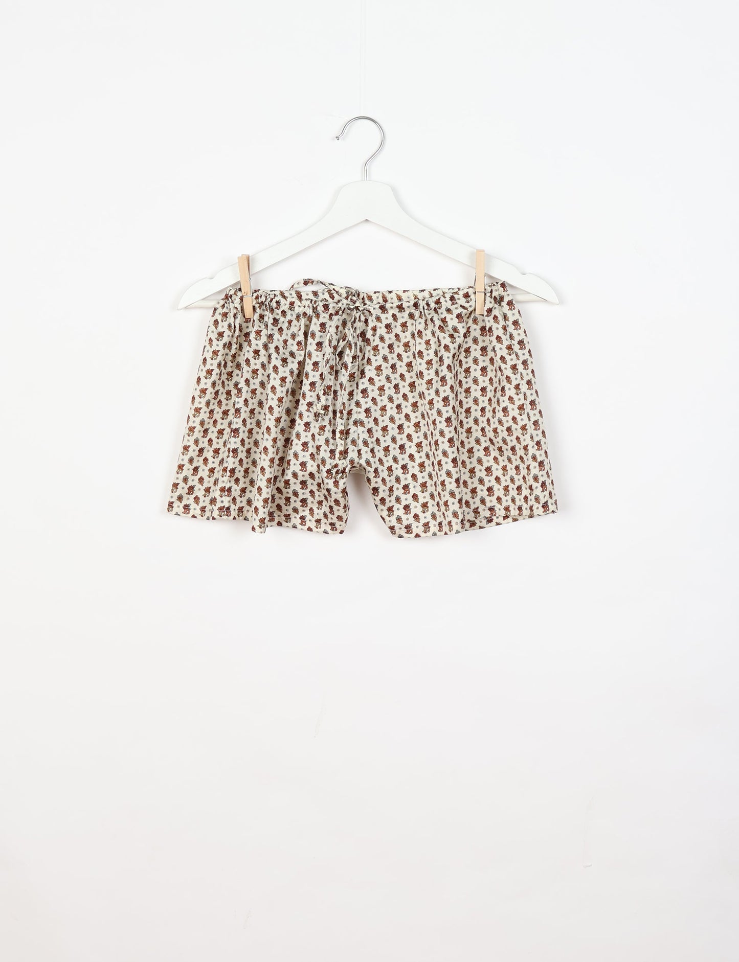 Sleep in eco-friendly luxury with our PJ Set Short. Made for the conscious consumer, these pajamas contribute to zero waste and sustainable practices. The cami top, adorned with delicate eyelash lace and cut on the bias, pairs seamlessly with the comfy shorts featuring an elasticated waist and drawstring tie.