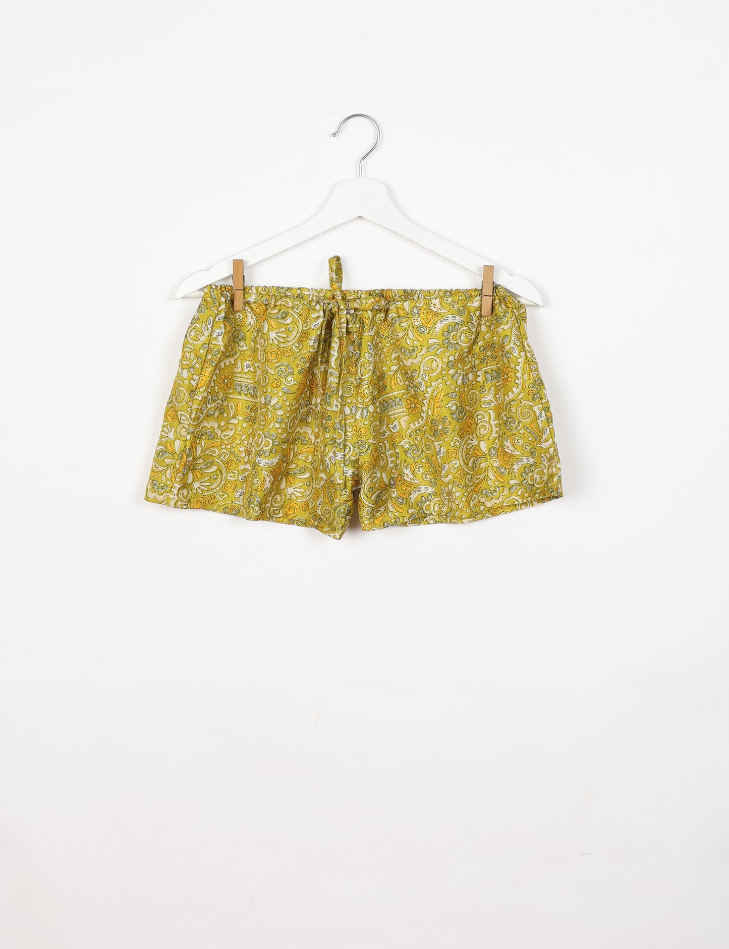 Sleep in eco-friendly luxury with our PJ Set Short. Made for the conscious consumer, these pajamas contribute to zero waste and sustainable practices. The cami top, adorned with delicate eyelash lace and cut on the bias, pairs seamlessly with the comfy shorts featuring an elasticated waist and drawstring tie.