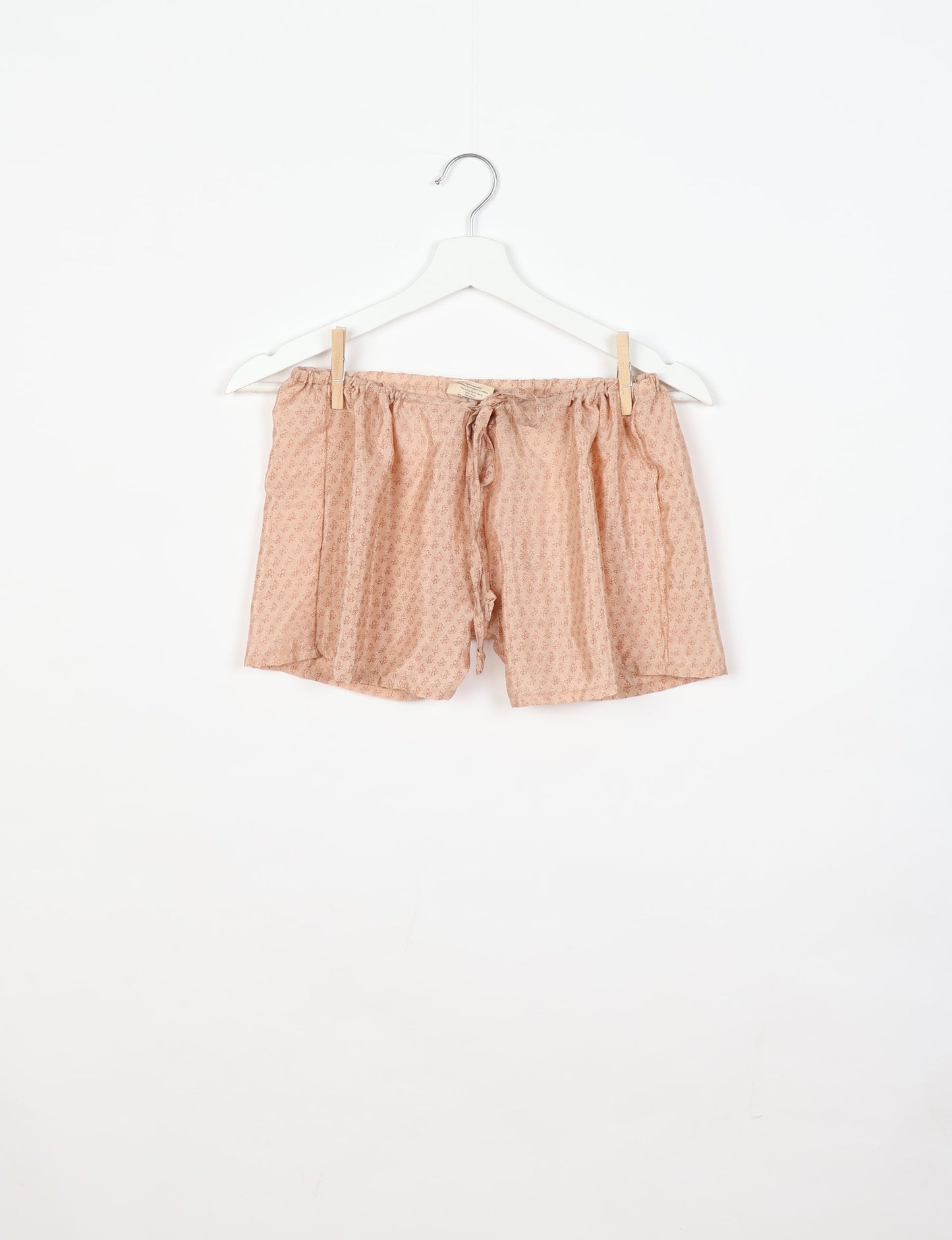 Sleep in eco-friendly luxury with our PJ Set Short. Made for the conscious consumer, these pajamas contribute to zero waste and sustainable practices. The cami top, adorned with delicate eyelash lace and cut on the bias, pairs seamlessly with the comfy shorts featuring an elasticated waist and drawstring tie.
