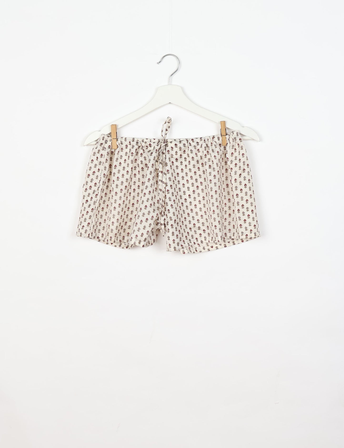 Sleep in eco-friendly luxury with our PJ Set Short. Made for the conscious consumer, these pajamas contribute to zero waste and sustainable practices. The cami top, adorned with delicate eyelash lace and cut on the bias, pairs seamlessly with the comfy shorts featuring an elasticated waist and drawstring tie.