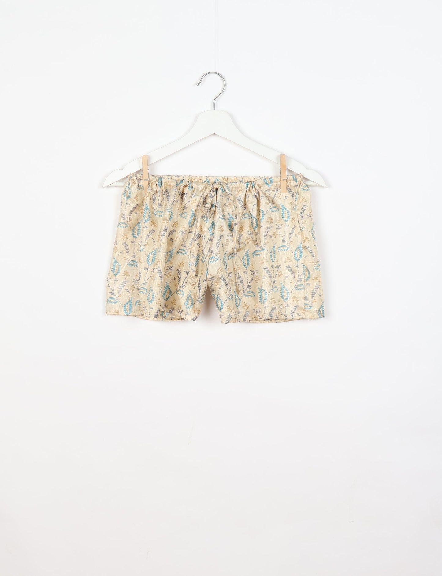 Sleep in eco-friendly luxury with our PJ Set Short. Made for the conscious consumer, these pajamas contribute to zero waste and sustainable practices. The cami top, adorned with delicate eyelash lace and cut on the bias, pairs seamlessly with the comfy shorts featuring an elasticated waist and drawstring tie.