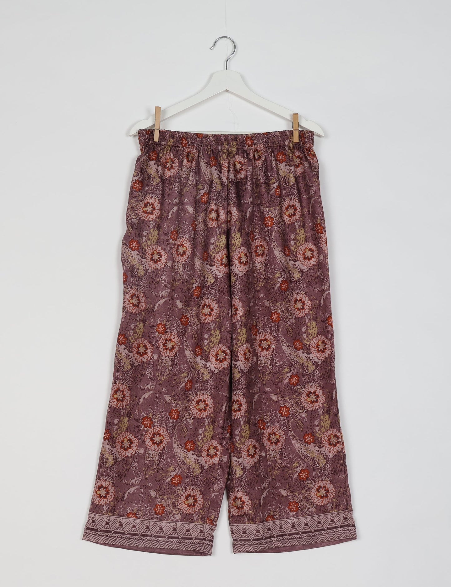 Discover the epitome of ethical sleepwear with our PJ Set Long – a blend of comfort, sustainability, and chic design. Crafted by skilled Mumbai artisans from upcycled saris, these pajamas redefine eco-friendly fashion, offering a conscious choice for your wardrobe.