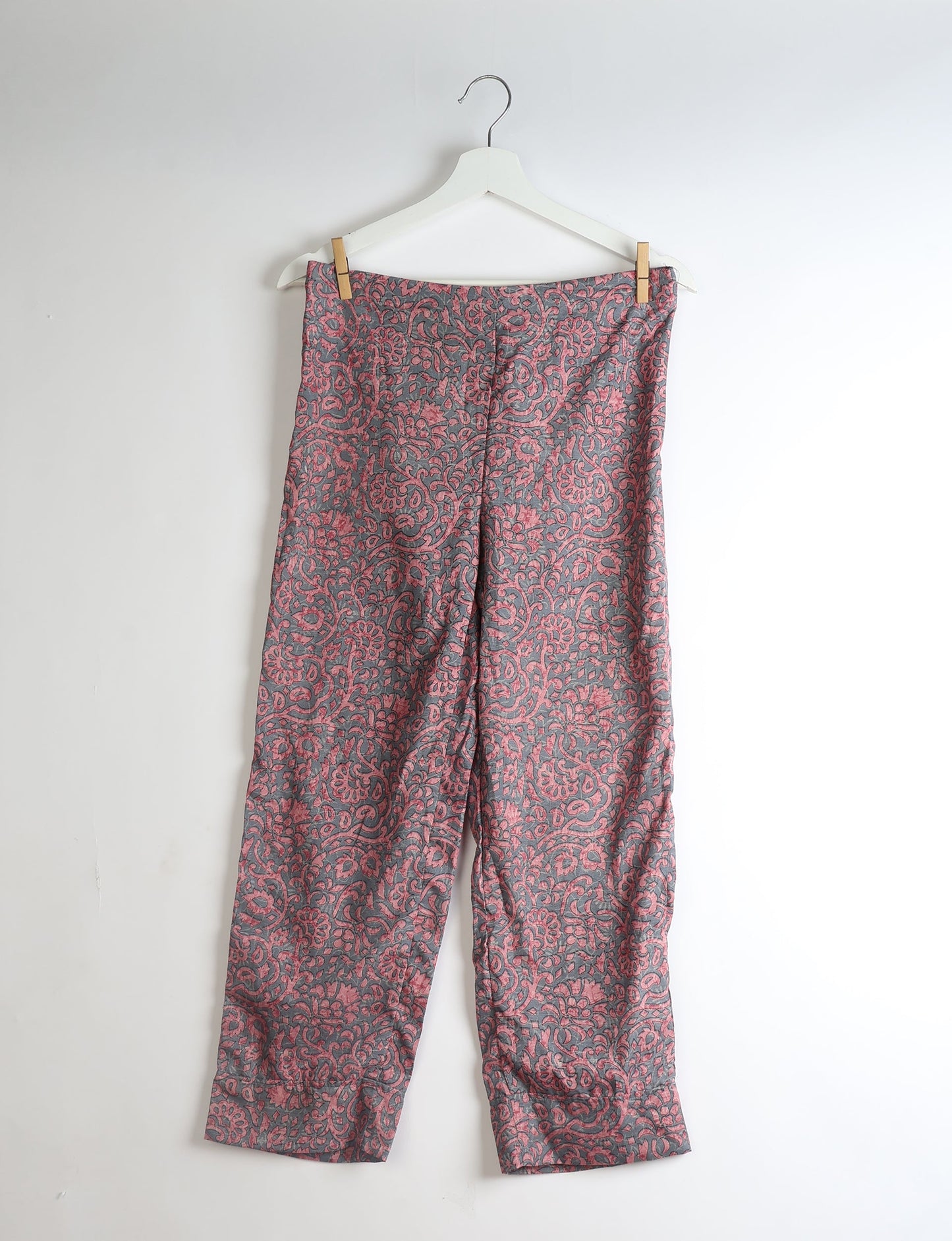 Discover the epitome of ethical sleepwear with our PJ Set Long – a blend of comfort, sustainability, and chic design. Crafted by skilled Mumbai artisans from upcycled saris, these pajamas redefine eco-friendly fashion, offering a conscious choice for your wardrobe.