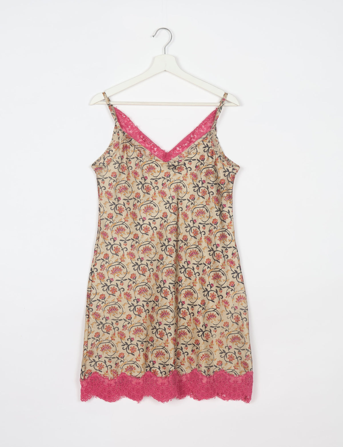 Experience nighttime luxury with our NIGHT DRESS – a true sleeping beauty crafted from upcycled sari fabric by dedicated artisans. Seamlessly combining purpose and comfort, these nightdresses offer a relaxed fit and lightweight material, ideal for sleeping, lounging, or enjoying a tranquil moment sipping coffee on your balcony.