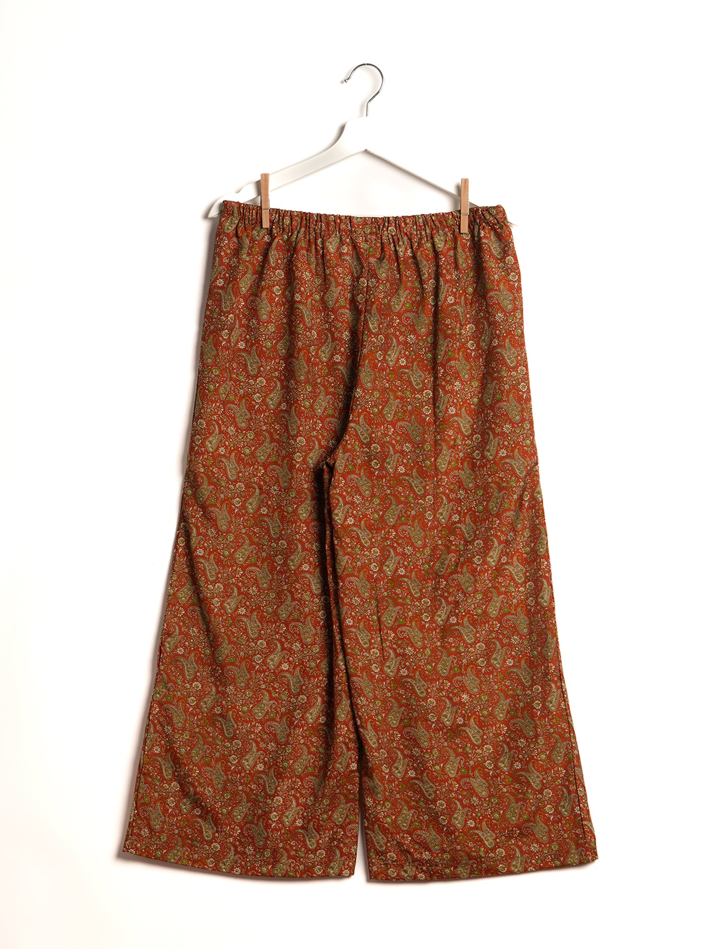 Step into sustainable fashion with our Palazzo Pants – a harmonious blend of Indian and Italian influences. These wide-legged pants, made from upcycled saris, offer comfort with an all-around elastic waist and a stylish flared leg. Make a statement with eco-friendly, chic palazzo pants that redefine ethical clothing.
