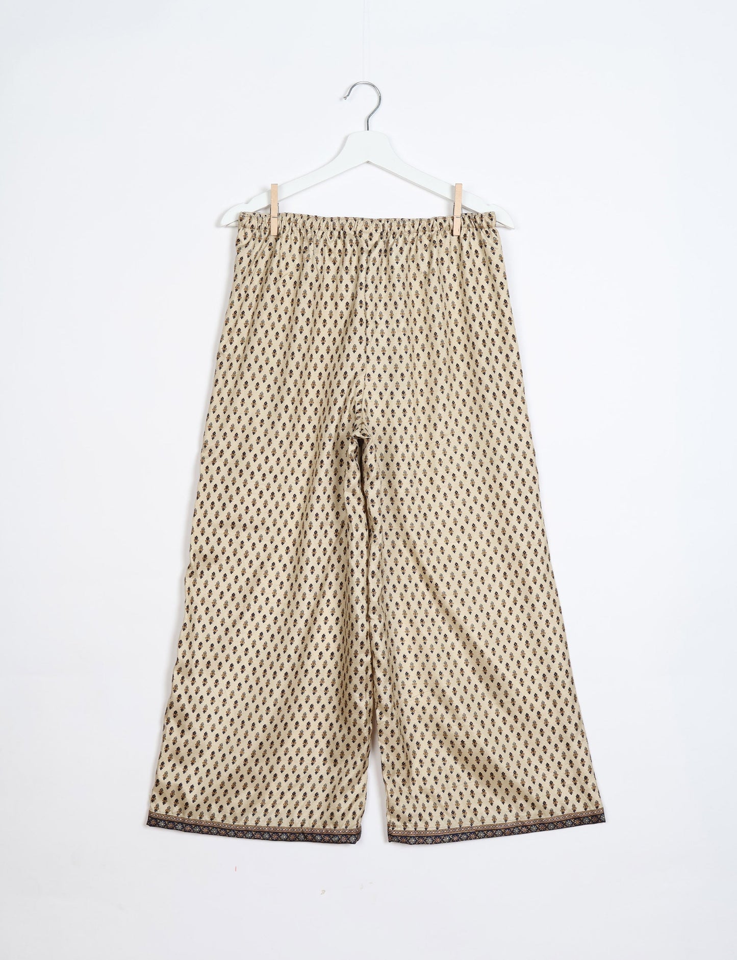 Step into sustainable fashion with our Palazzo Pants – a harmonious blend of Indian and Italian influences. These wide-legged pants, made from upcycled saris, offer comfort with an all-around elastic waist and a stylish flared leg. Make a statement with eco-friendly, chic palazzo pants that redefine ethical clothing.