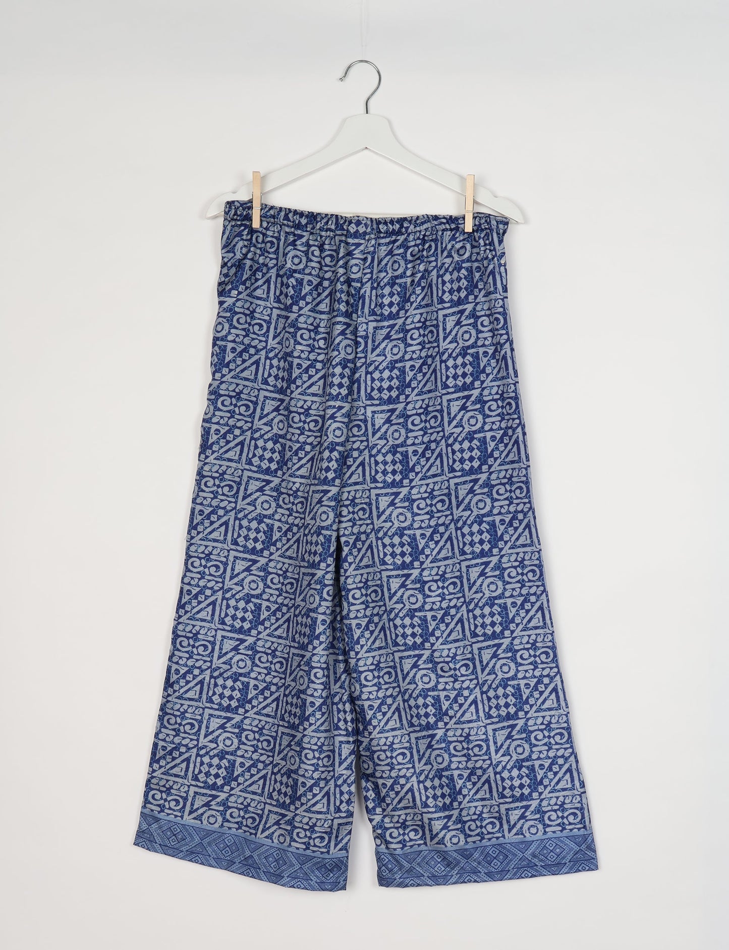 Step into sustainable fashion with our Palazzo Pants – a harmonious blend of Indian and Italian influences. These wide-legged pants, made from upcycled saris, offer comfort with an all-around elastic waist and a stylish flared leg. Make a statement with eco-friendly, chic palazzo pants that redefine ethical clothing.
