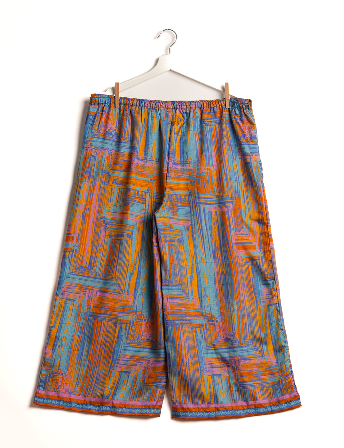 Step into sustainable fashion with our Palazzo Pants – a harmonious blend of Indian and Italian influences. These wide-legged pants, made from upcycled saris, offer comfort with an all-around elastic waist and a stylish flared leg. Make a statement with eco-friendly, chic palazzo pants that redefine ethical clothing.
