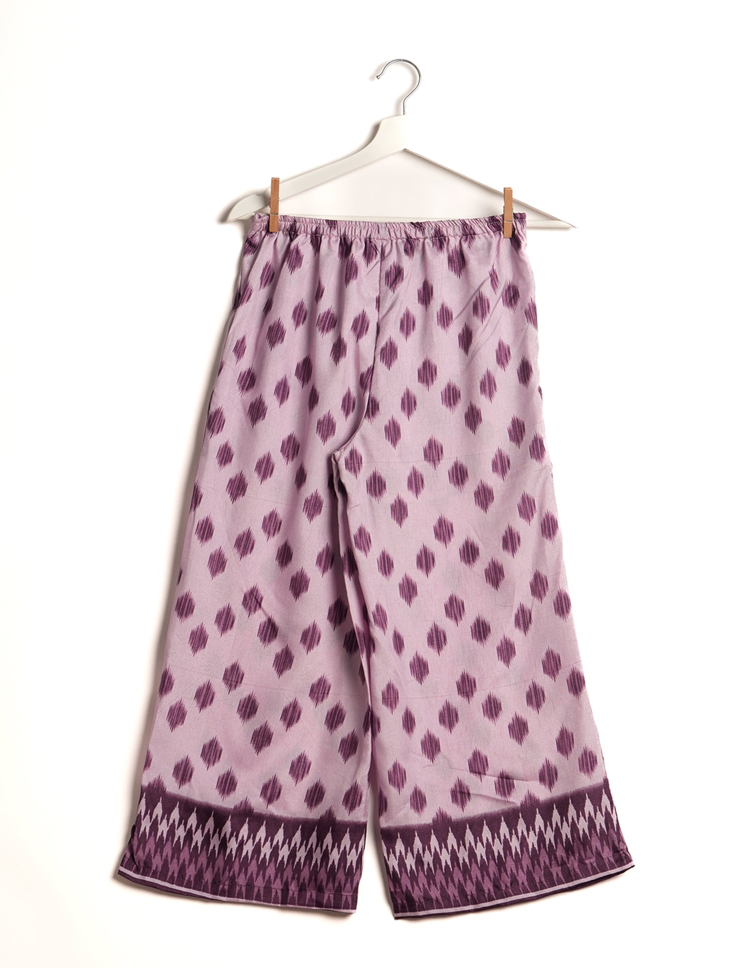 Step into sustainable fashion with our Palazzo Pants – a harmonious blend of Indian and Italian influences. These wide-legged pants, made from upcycled saris, offer comfort with an all-around elastic waist and a stylish flared leg. Make a statement with eco-friendly, chic palazzo pants that redefine ethical clothing.
