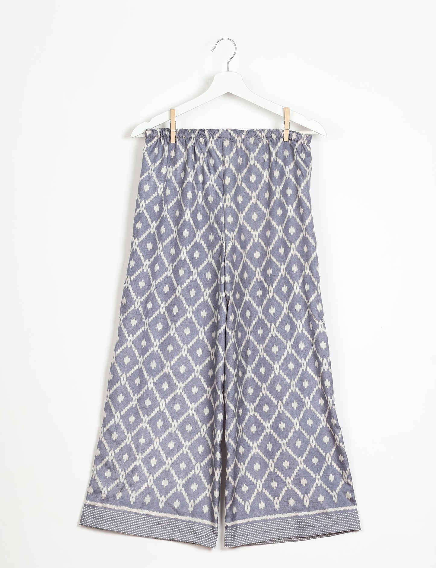 Step into sustainable fashion with our Palazzo Pants – a harmonious blend of Indian and Italian influences. These wide-legged pants, made from upcycled saris, offer comfort with an all-around elastic waist and a stylish flared leg. Make a statement with eco-friendly, chic palazzo pants that redefine ethical clothing.