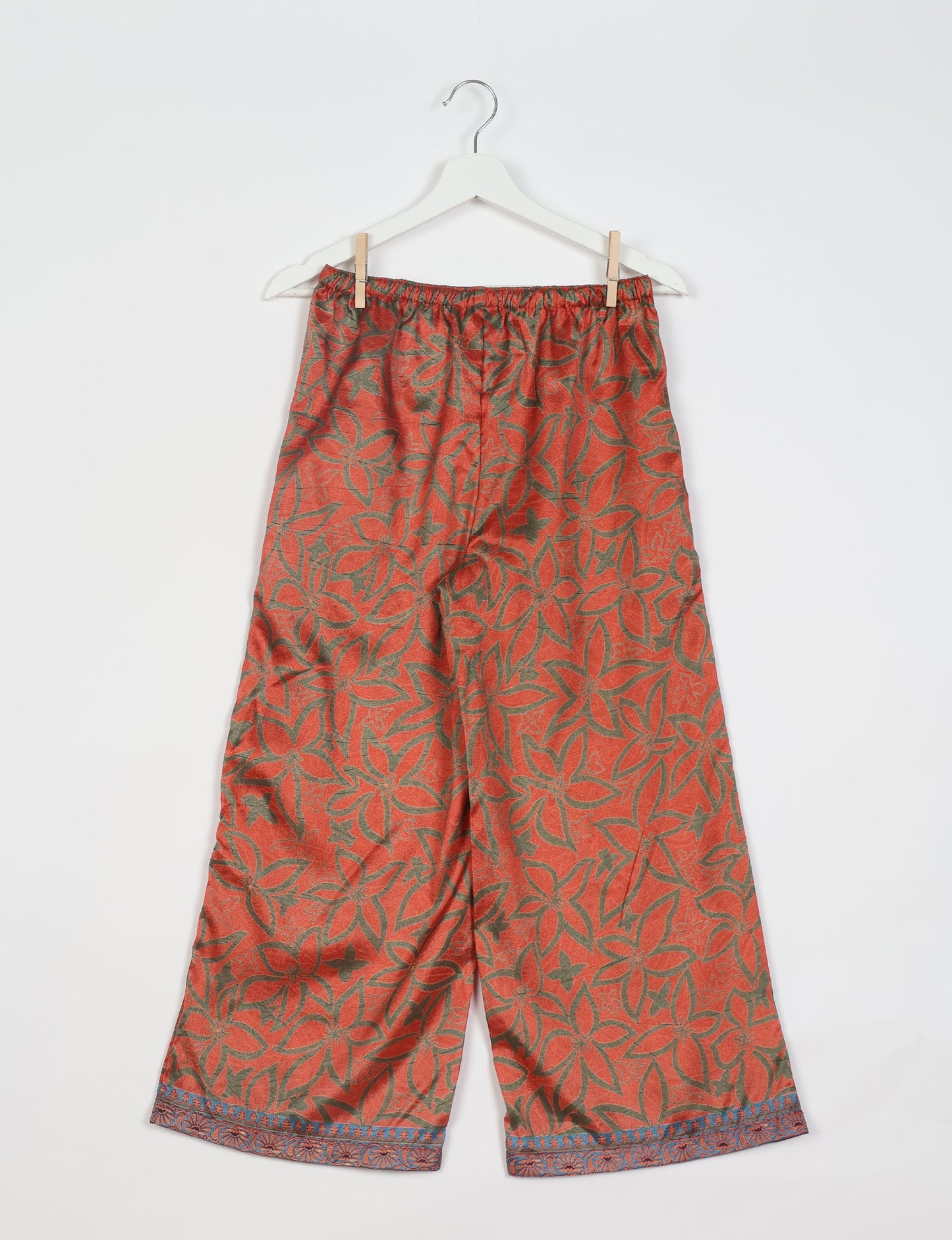 Step into sustainable fashion with our Palazzo Pants – a harmonious blend of Indian and Italian influences. These wide-legged pants, made from upcycled saris, offer comfort with an all-around elastic waist and a stylish flared leg. Make a statement with eco-friendly, chic palazzo pants that redefine ethical clothing.