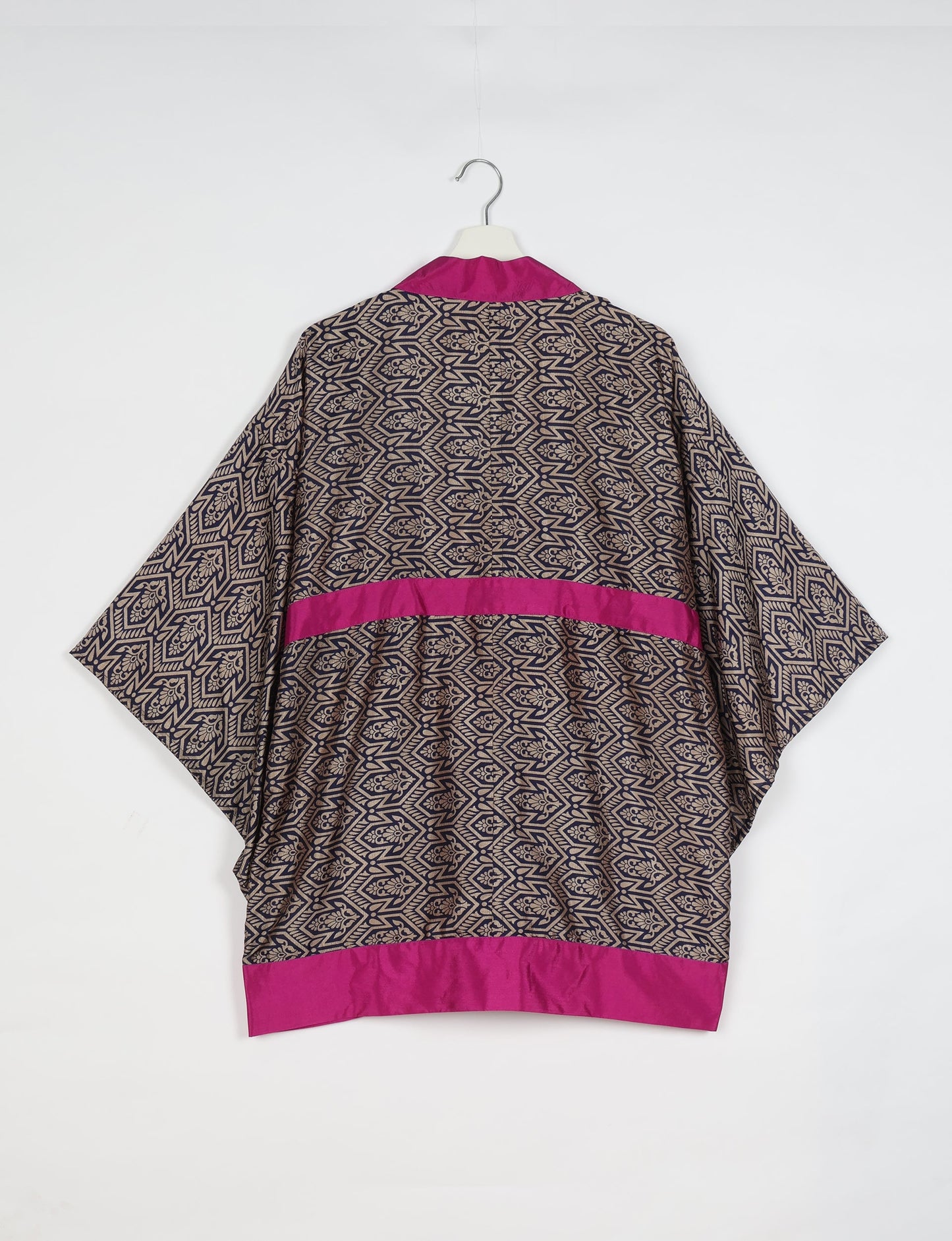 Radiant and sustainably crafted KIMONO with humble beginnings from the streets of India. Versatile and eco-friendly layering piece for casual trousers, swimwear, or our spaghetti strap dress. Embrace conscious fashion and sustainable style with this unique and culturally inspired kimono, sure to invite compliments.