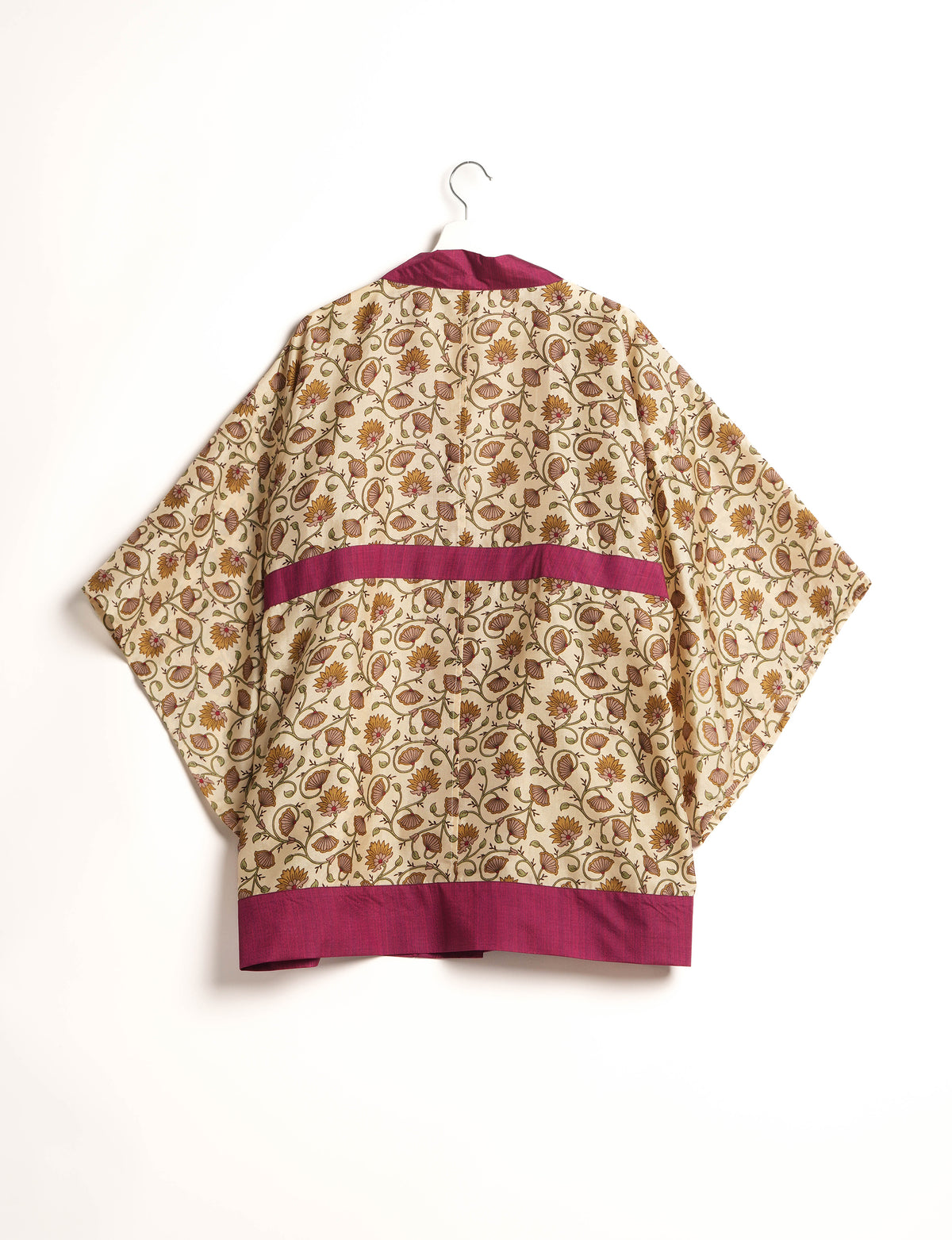 Radiant and sustainably crafted KIMONO with humble beginnings from the streets of India. Versatile and eco-friendly layering piece for casual trousers, swimwear, or our spaghetti strap dress. Embrace conscious fashion and sustainable style with this unique and culturally inspired kimono, sure to invite compliments.